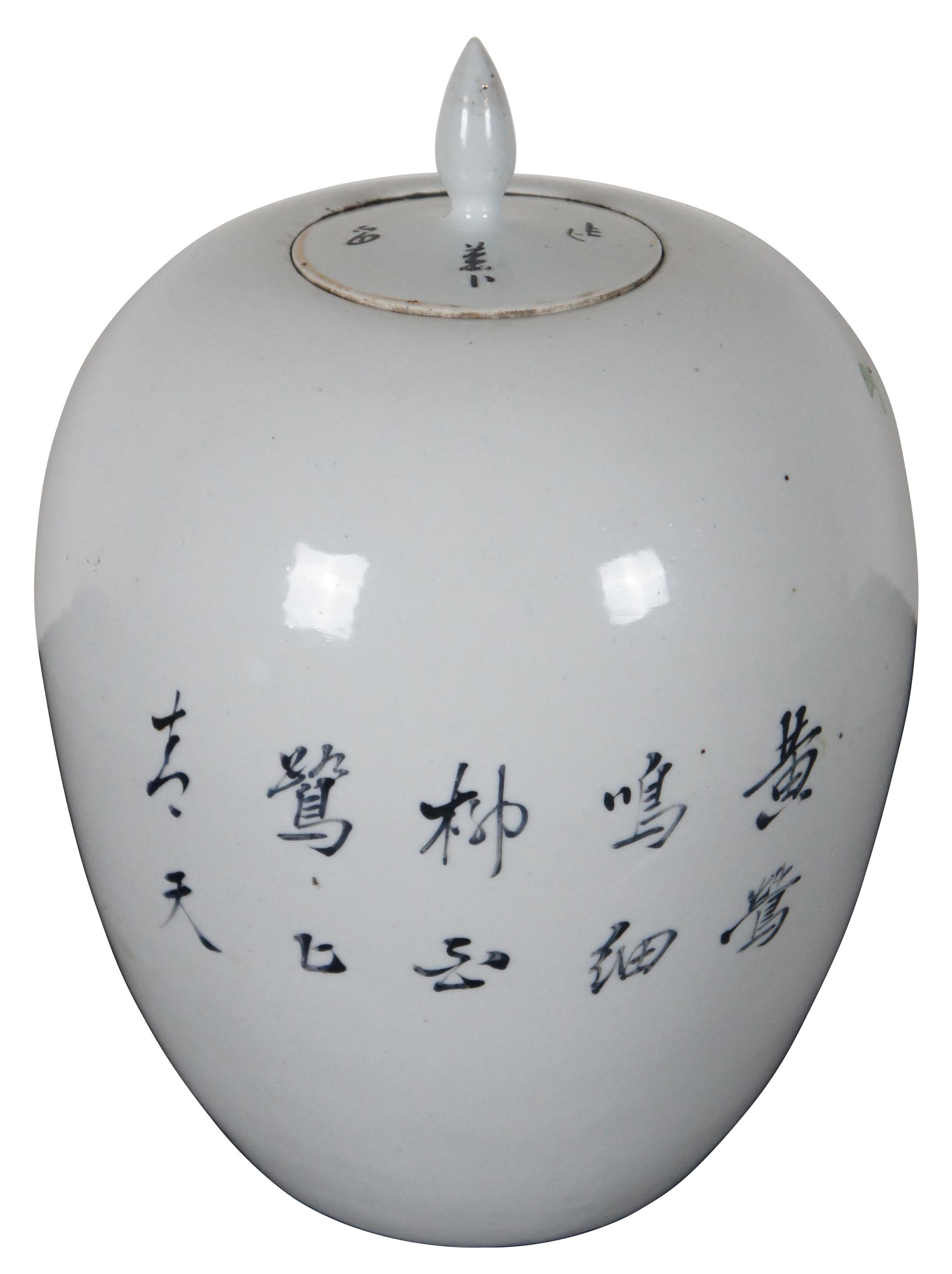Antique Chinese famille rose porcelain lidded ginger jar or pot decorated with a bird on a branch, butterfly, and calligraphy. Measure: 12