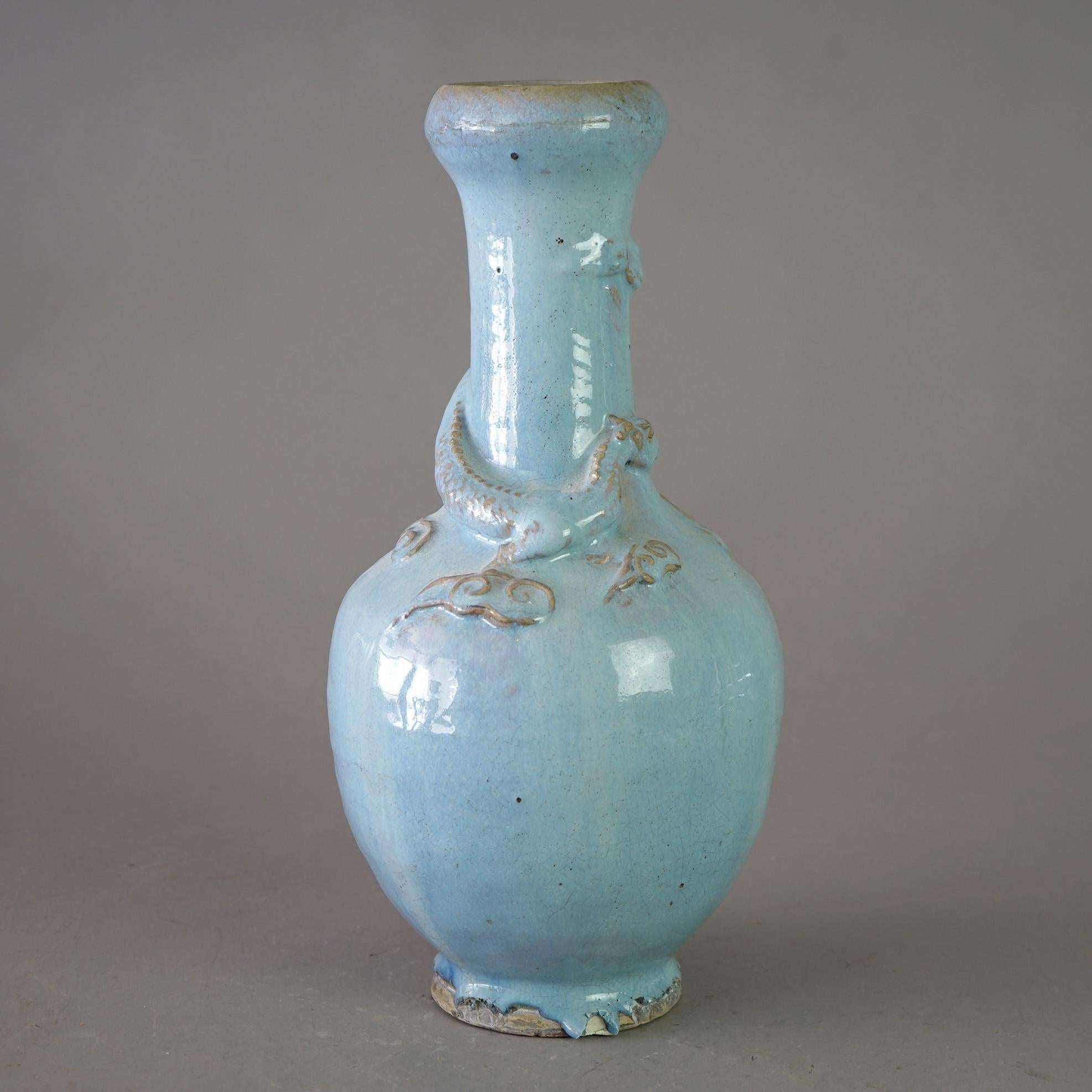 An antique figural Chinese vase offers art pottery construction with applied dragon, c1920

Measures - 15