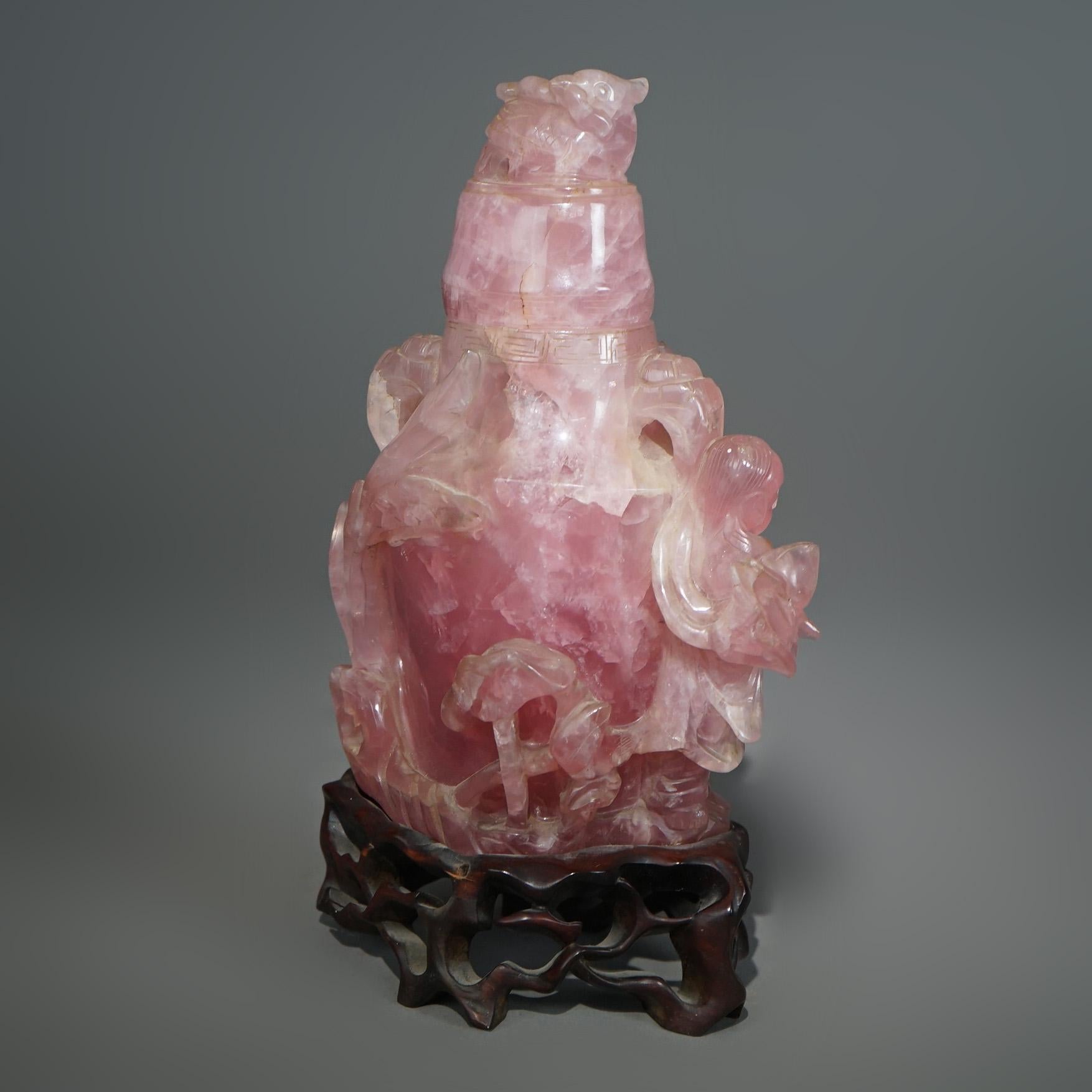 Antique Chinese Figural Carved Rose Quartz Covered Jar on Carved Hardwood Base c1890

Measures - 10.25