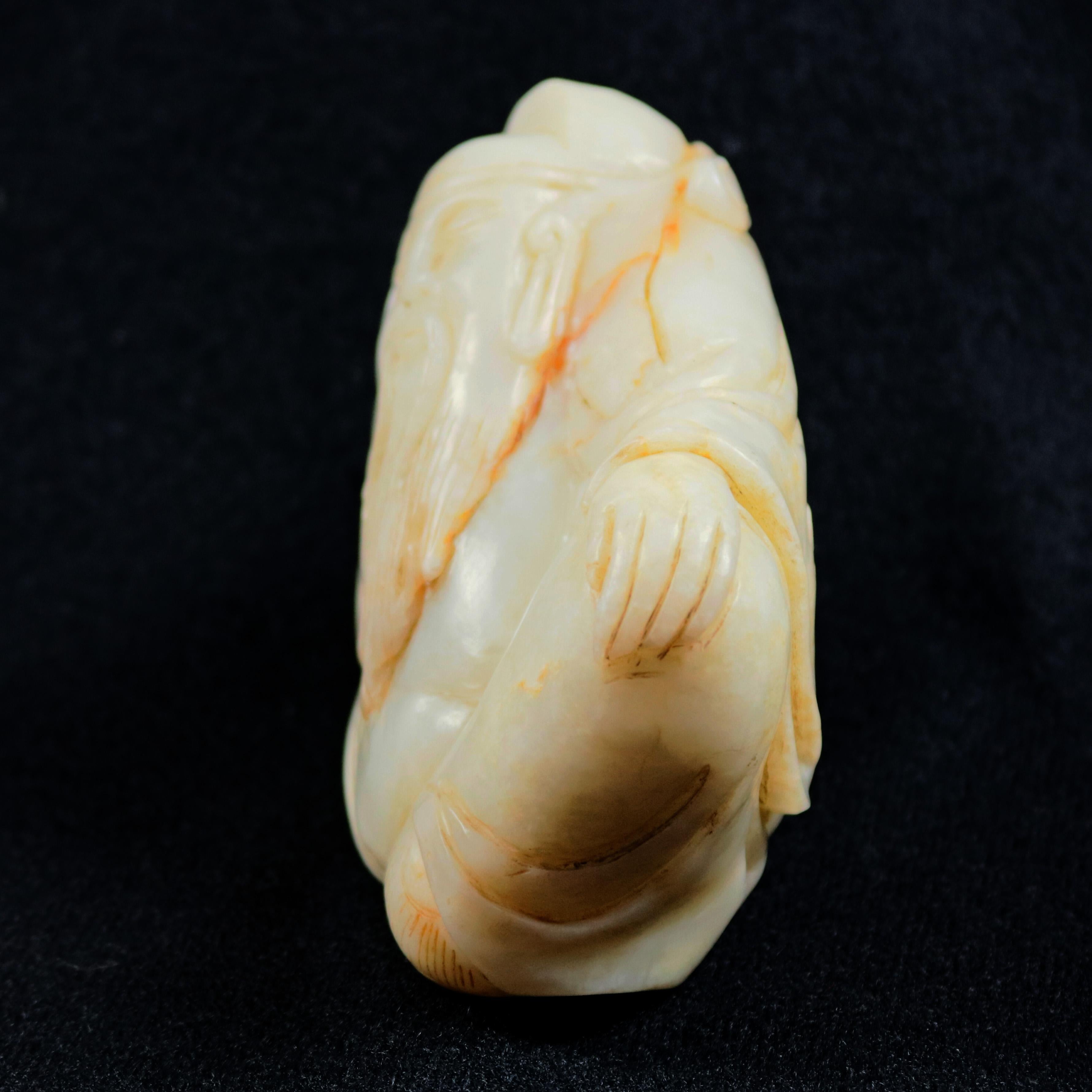 white jade buddha statue