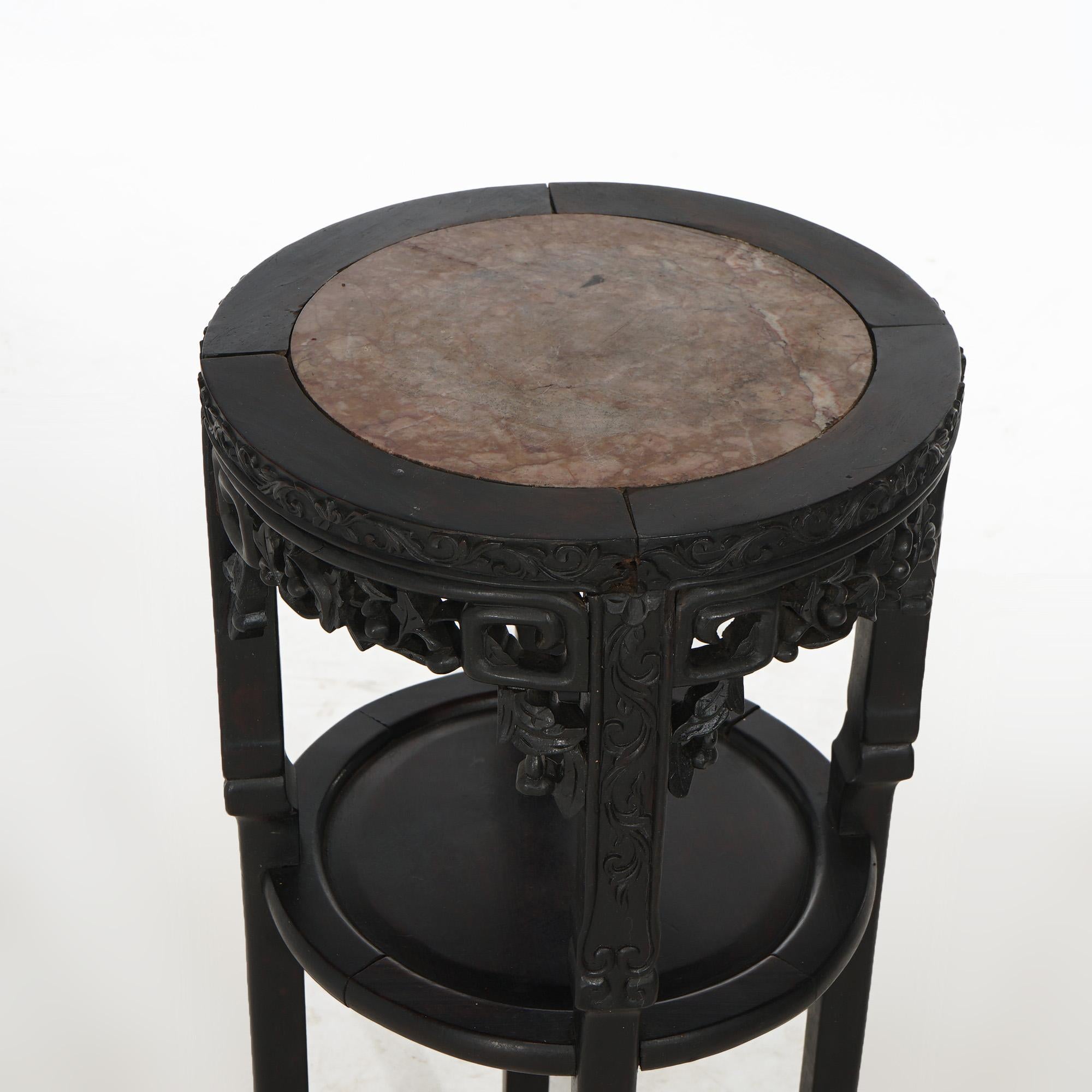 Antique Chinese Foliate Carved Rosewood Circular Fern Stand with Inset Rouge Marble Top & Lower Display Shelf, C1900

Measures- 31.5''H x 14''W x 14''D