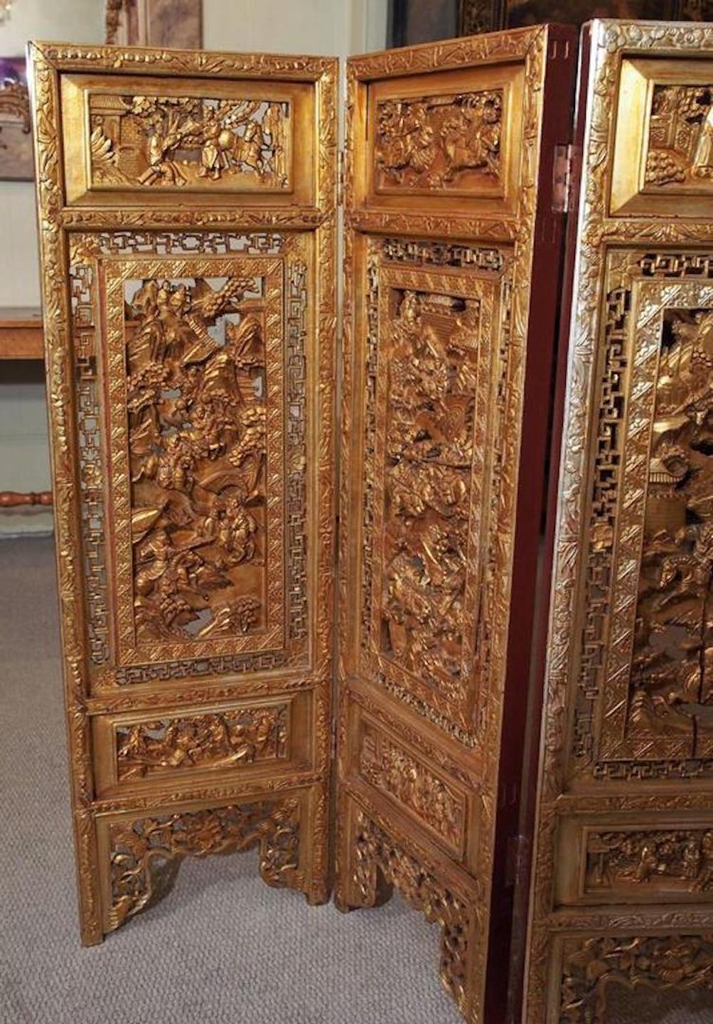 Paravent chinois ancien à quatre panneaux.