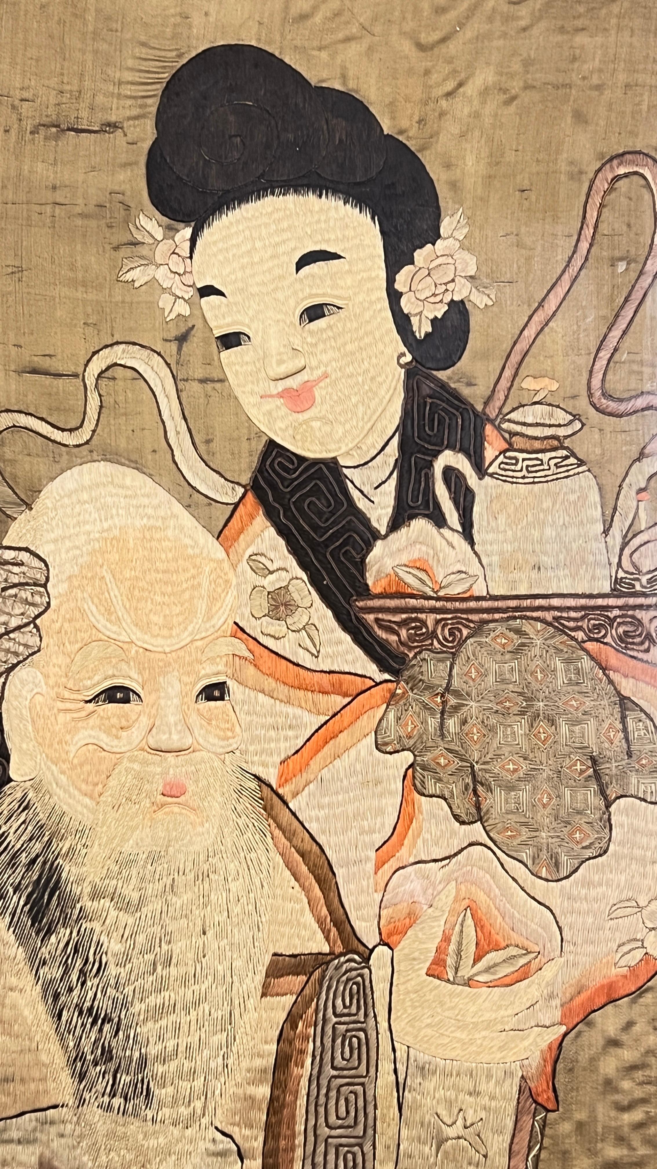 Hand-Woven Antique Chinese Framed Embroidered Needlework Depicting Shou Lao and Attendant For Sale