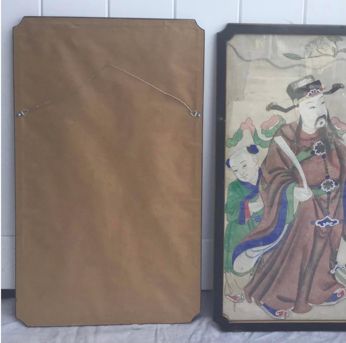 A pair of 19th century Chinese painted fabric panels. Now framed in matching black frames with gilt highlights. Very fine pieces with gorgeous masterful work. Very detailed with raised highlights. Appears to be watercolor or gouache on silk.