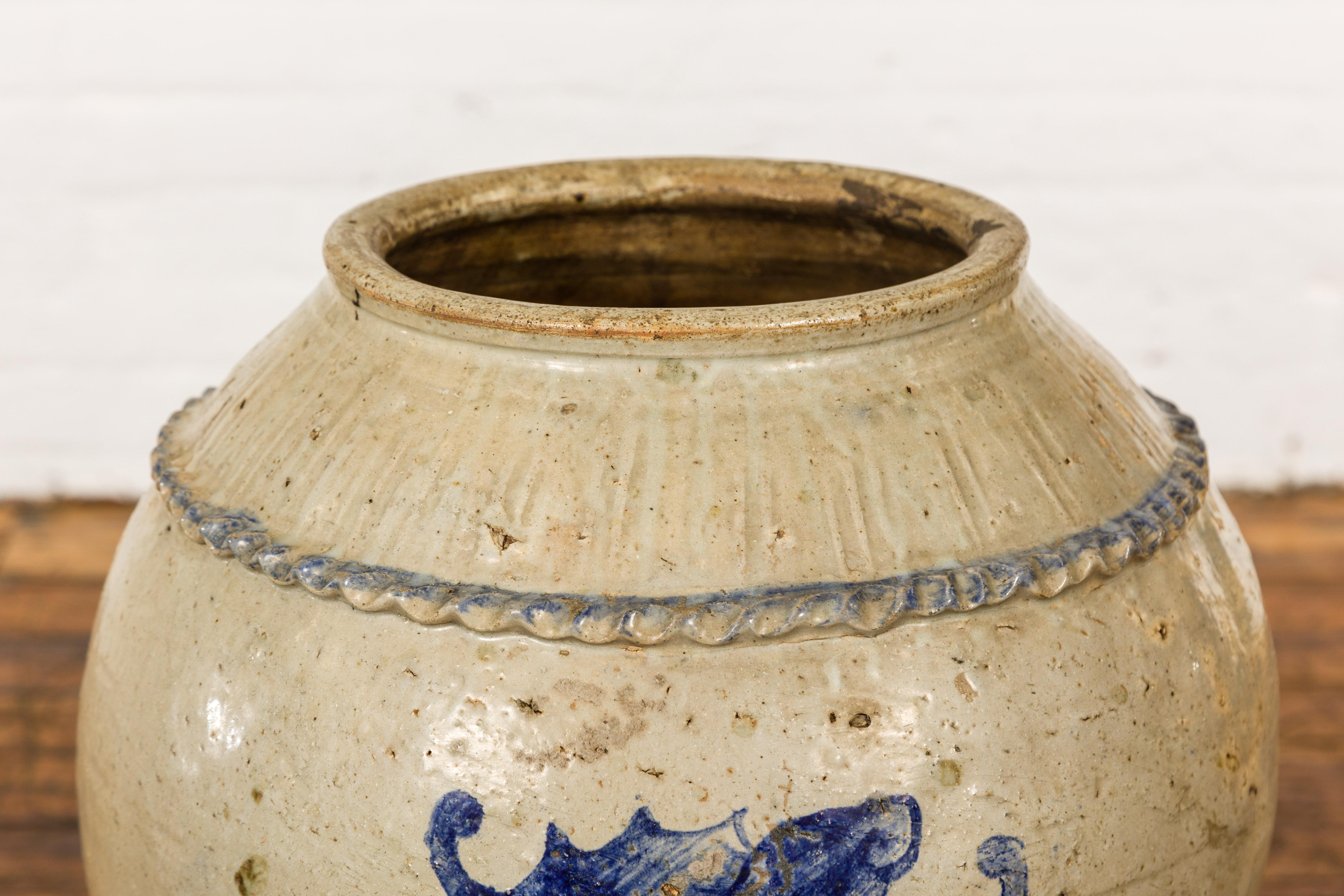 Antique Chinese Glazed Ceramic Storage Jar with Blue Painted Motifs For Sale 4