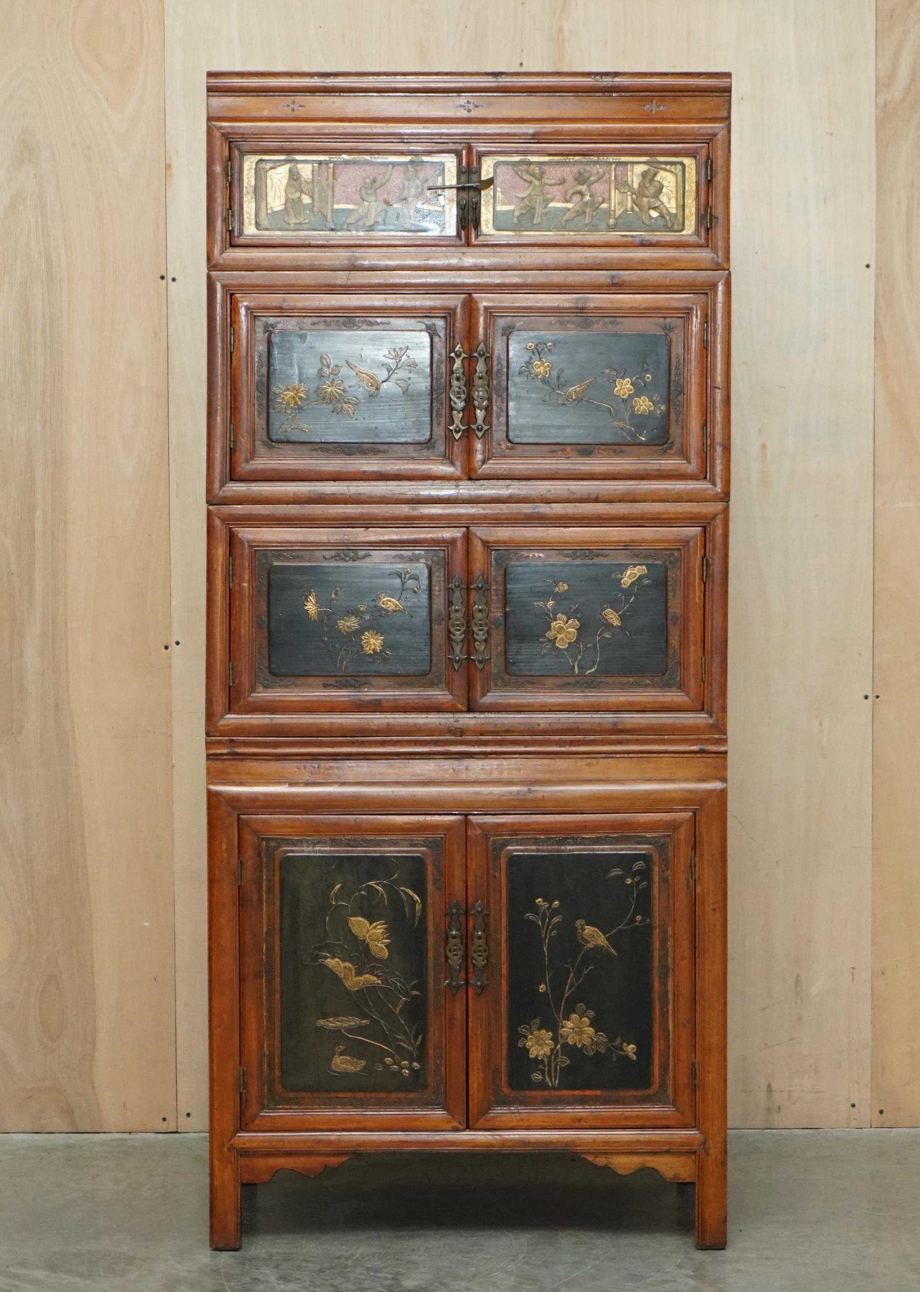 We are delighted to offer for sale this very fine circa 1880 Antique Chinese hand carved stackable compound cupboard with military campaign style side handles

A very rare, important and collectable piece of antique Chinese furniture, this piece