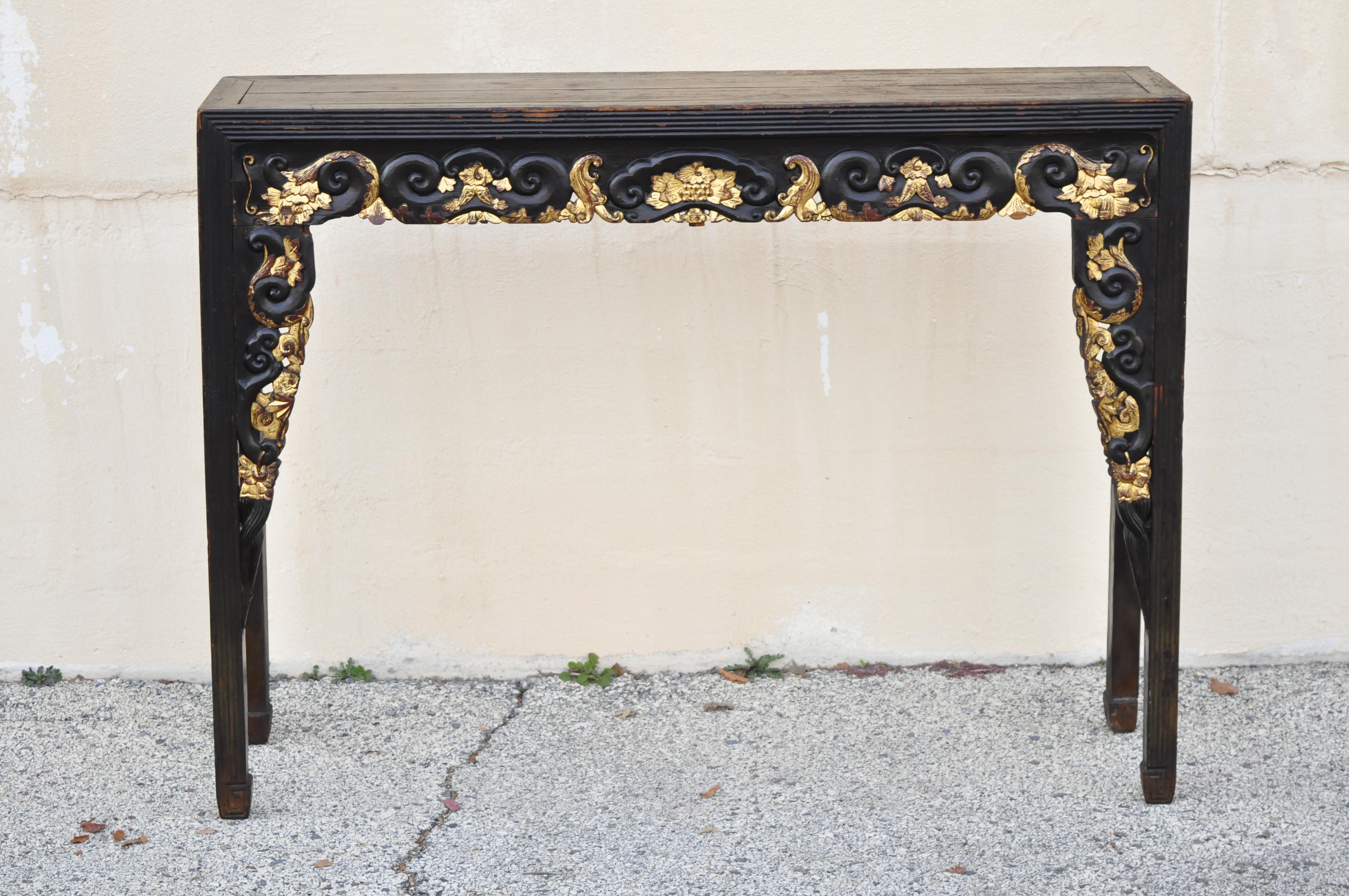 Antique Chinese hardwood tall altar table console table carved gold gilt detail. Item features gold gilt details, tall impressive size, solid wood construction, distressed finish, nicely carved details, very nice antique item, great style and form.