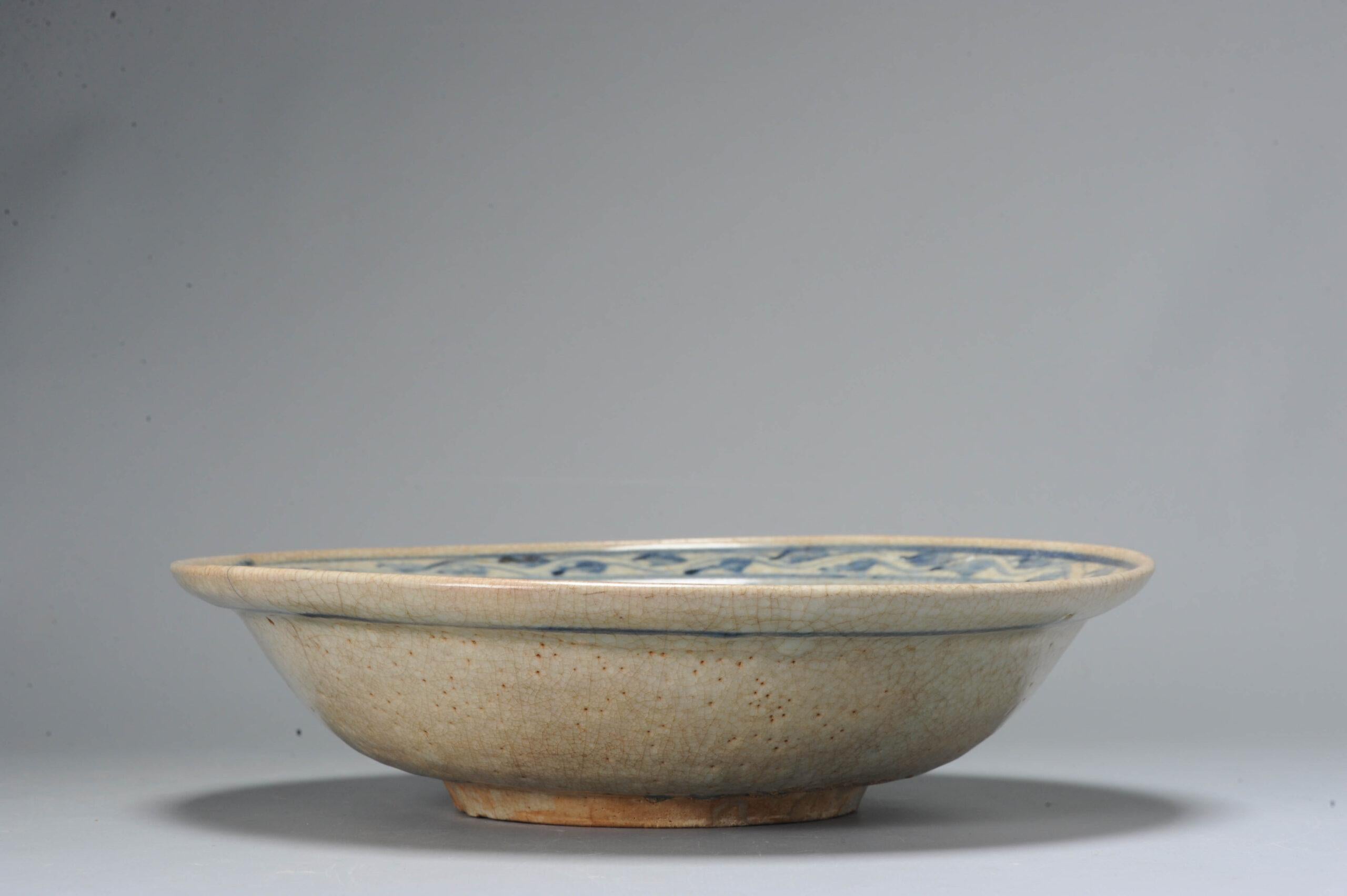 A very nicely decorated Charger from the 15th/16th century.

Additional information:
Material: Porcelain & Pottery
Type: Chargers (Large Plates)
Color: Blue & White
Region of Origin: China
Period: 15th century, 16th century Ming & Transitional (1368