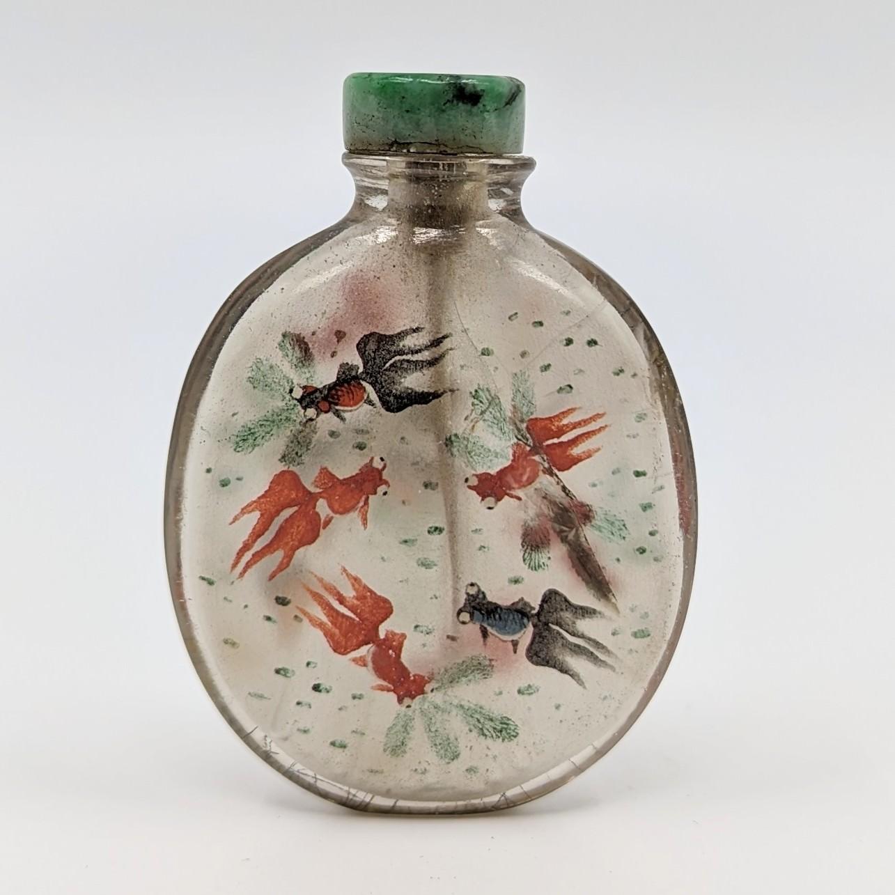An antique Chinese inside painted rutile hair crystal snuff bottle, signed 