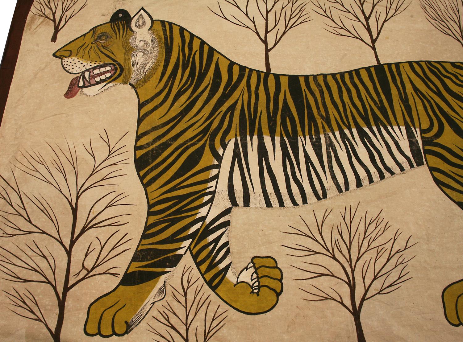 A Remarkable and attractive antique handmade textile that can win the heart of any person. The existence of the tiger has always been a symbol of power and strength and you can instantly feel that power by looking at this amazing textile. Great
