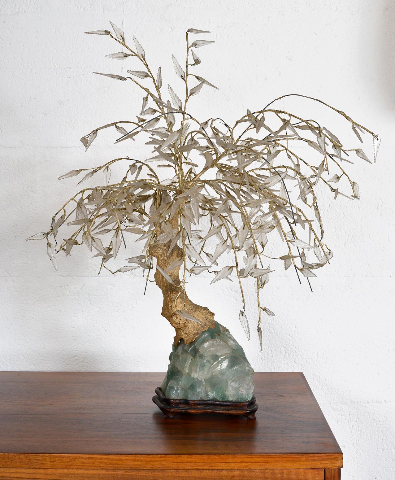 A wonderful, highly decorative, original Bonsai tree dating from the 1940s, which is both robust and delicate. Pieces of glass have been intricately carved to form realistic leaves, and the wire branches are neatly covered in silk threads, which