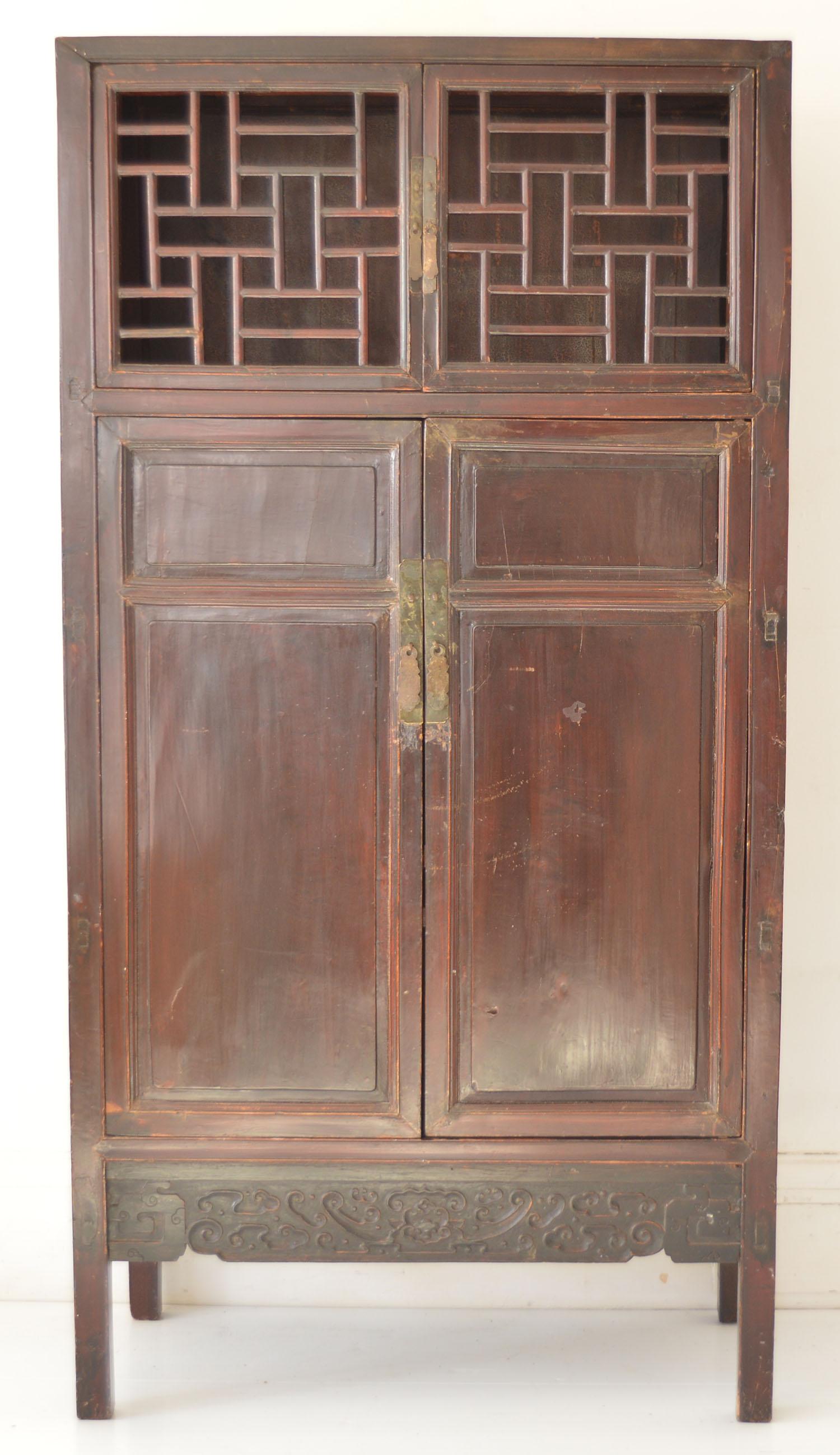 Great Chinese lacquered cabinet.

Slightly distressed rustic piece.

It is a decorators piece and not for the purist. There is evidence to suggest the lattice work is possibly a later adaptation. Maybe the drawers have been added.

I