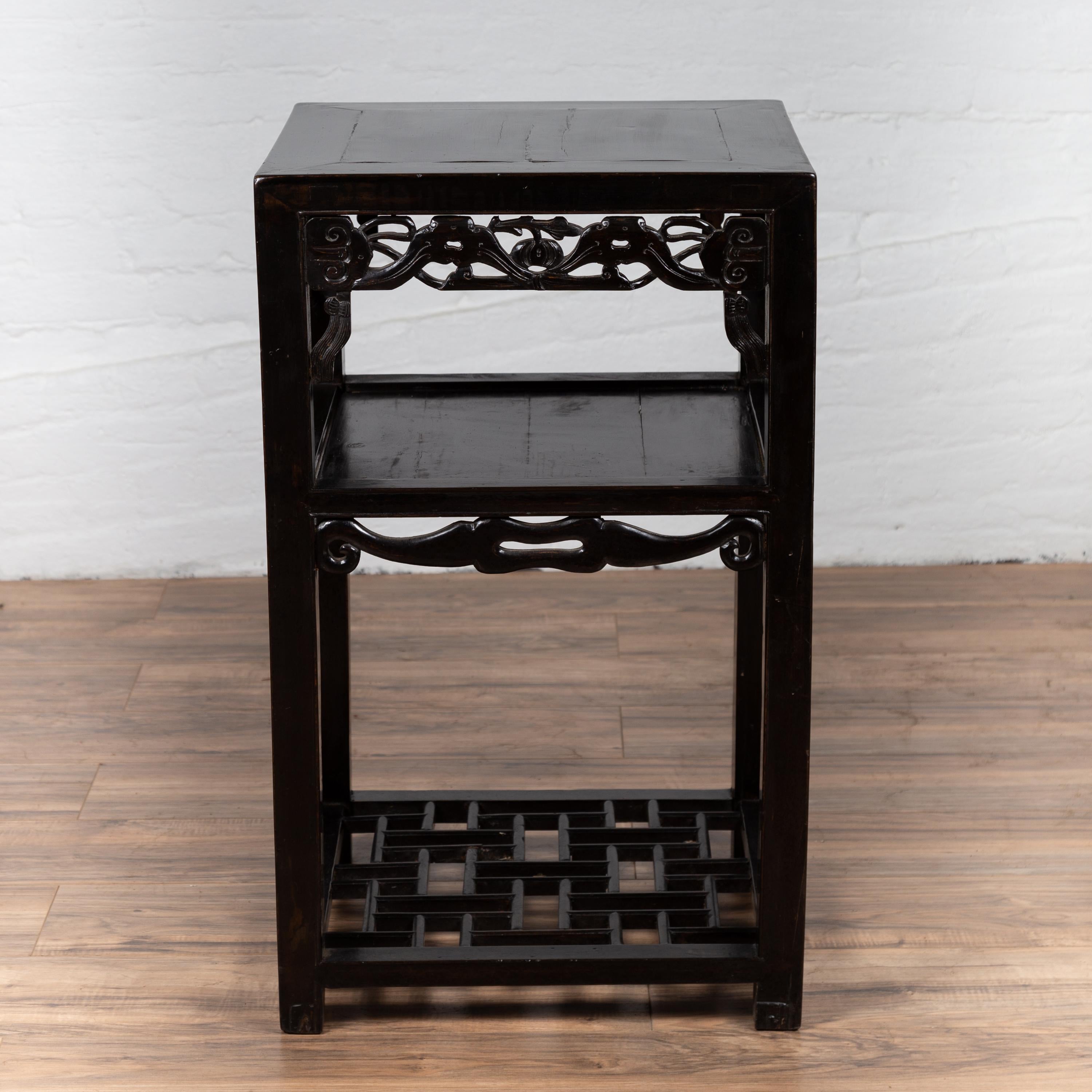 Carved Antique Chinese Lamp Table with Dark Patina, Pierced Apron and Geometric Design