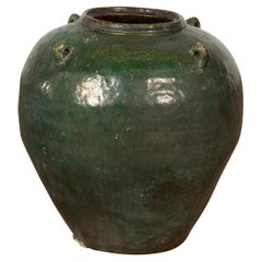 Petite jarre ancienne en céramique émaillée vert foncé