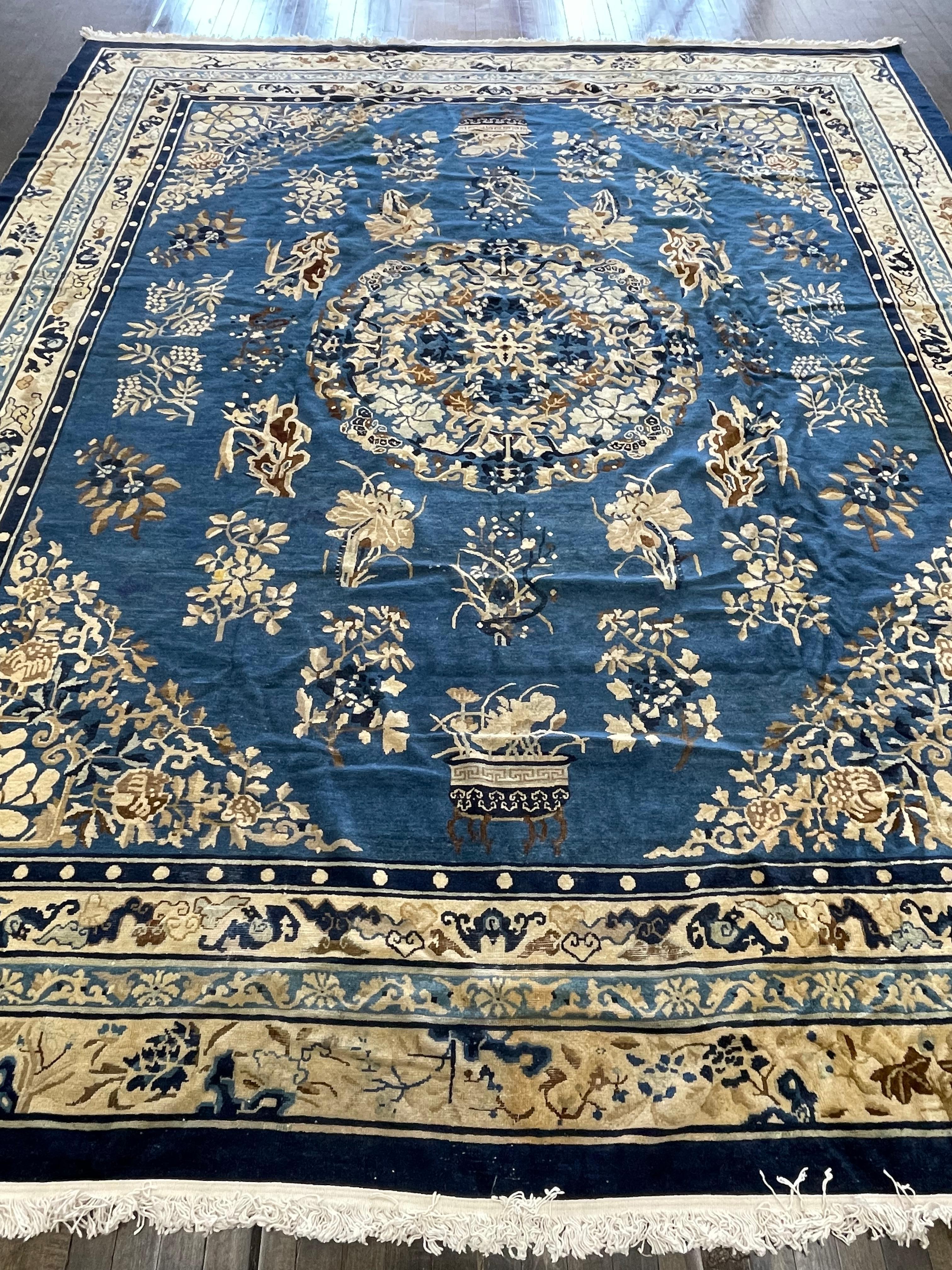 This carpet is hand woven in China. A classical 19th century chinese rug with beautifully decorated field framed with multi borders of fretwork. Structurally this carpet made fairly uniform, with double-wefted cotton foundations on to which the