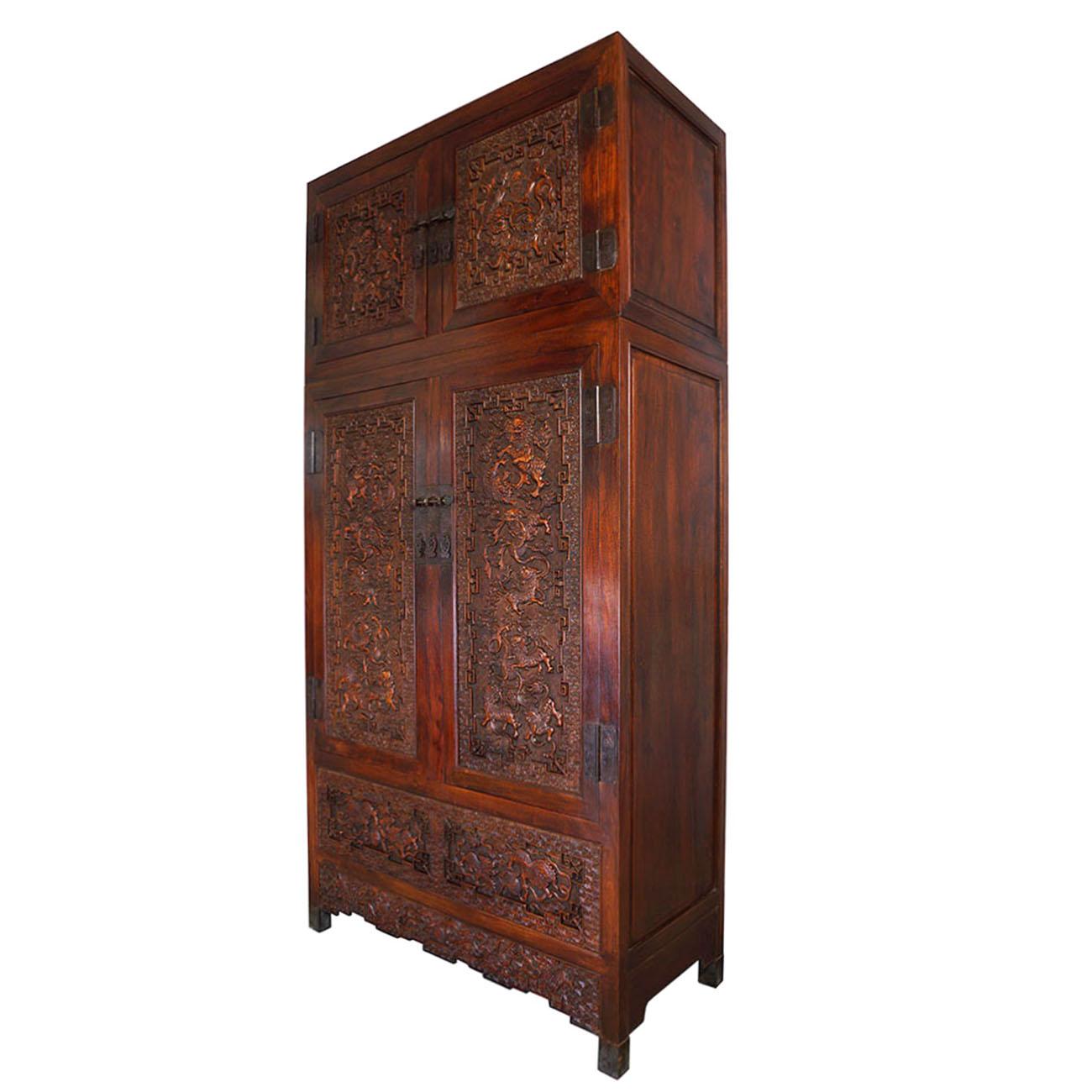 Size: 96in H x 47in W x 21 3/4in D
Door opening: top: 21 1/2in H x 42 1/2in W
Lower cabinet: 43 1/2in H x 42 1/2in W
Origin: China
Circa: 1900
Material: Camphor wood
Condition: Solid wood construction, finished on sides/back, beautiful massive