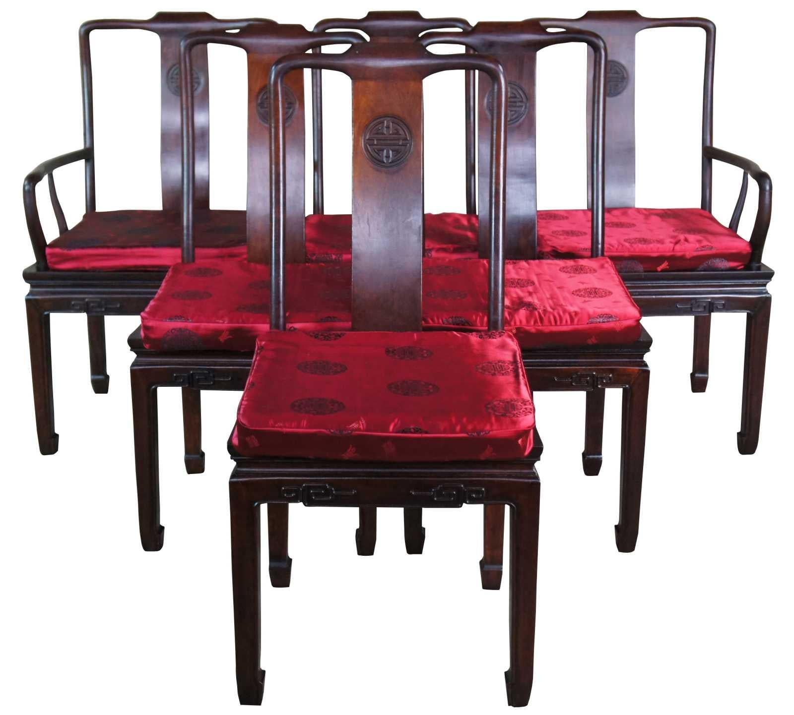 Antique Chinese Chinoiserie Ming Rosewood dining set. Made of solid rosewood with chinese meander and classical carved Fu prospertiy (luck) medalions. Made in Hong Kong.

The character Fú meaning 