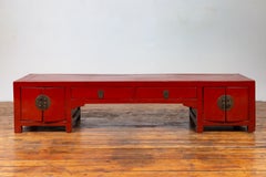 Antique Chinese Ming Style Red Lacquered Low Kang Cabinet with Doors and Drawers