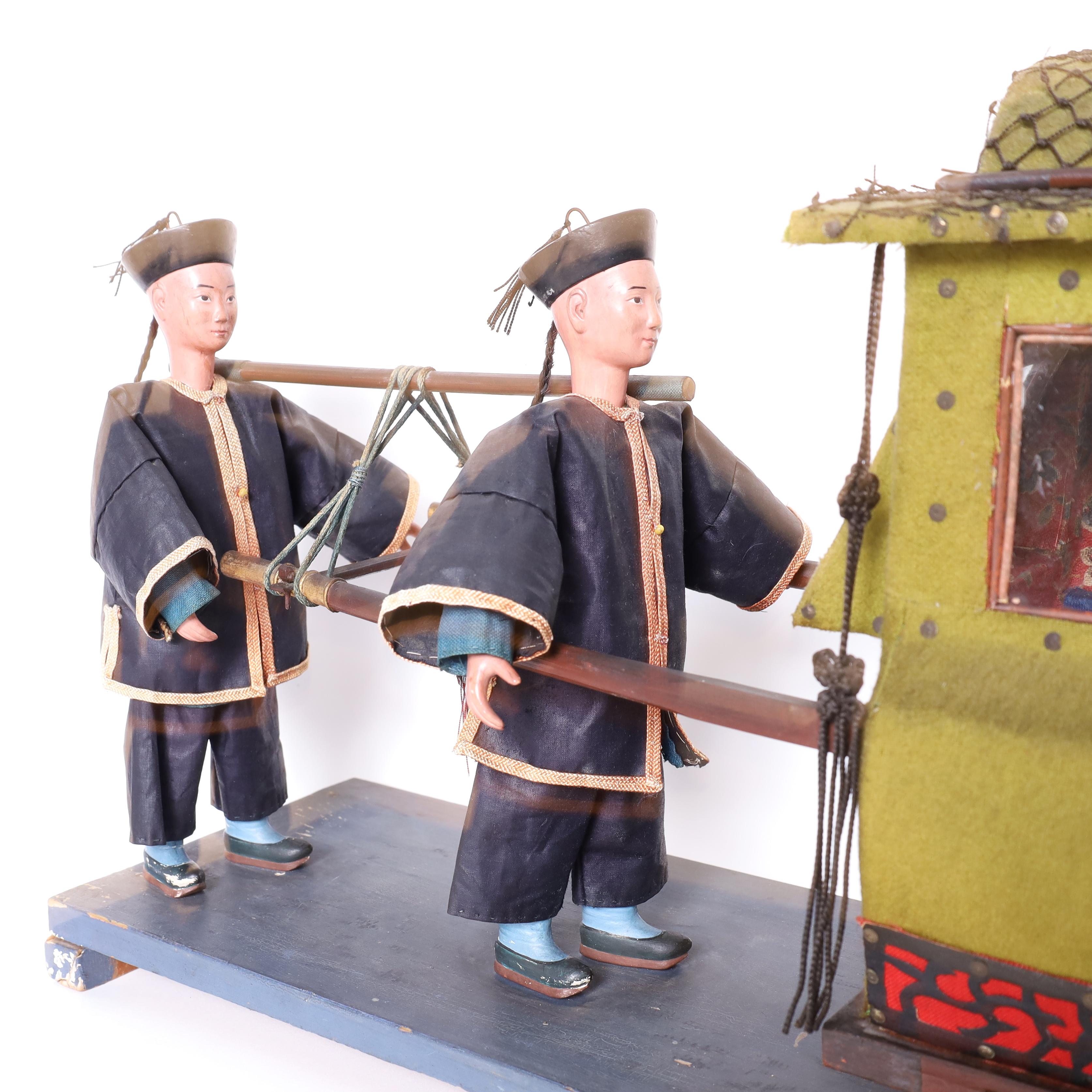 Modèle chinois ancien d'un souverain porté à Sedan ou au chariot en vente 3