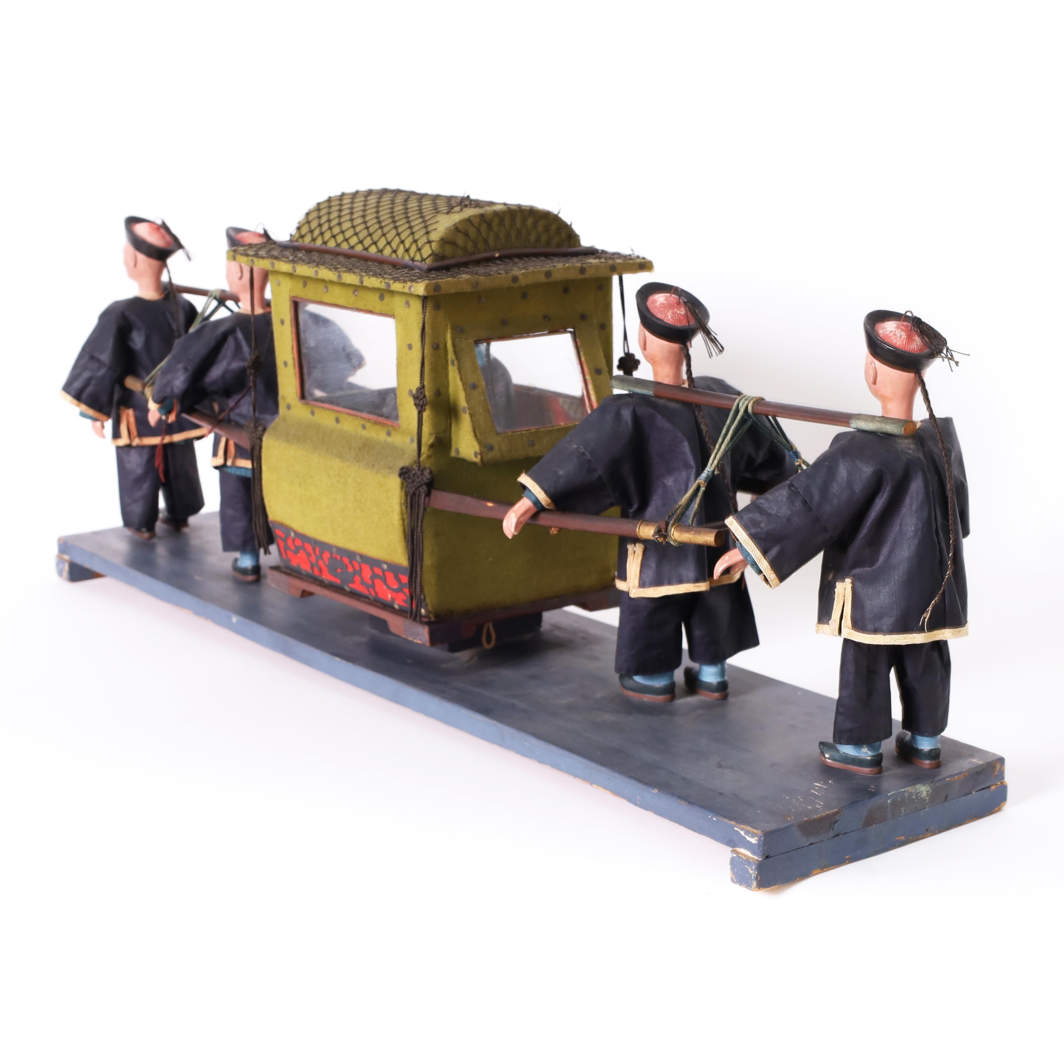 Modèle chinois ancien d'un souverain porté à Sedan ou au chariot en vente 4