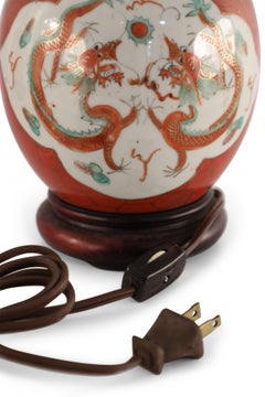 Antique Chinese Orange and White Dragon Motif Porcelain Table Lamp