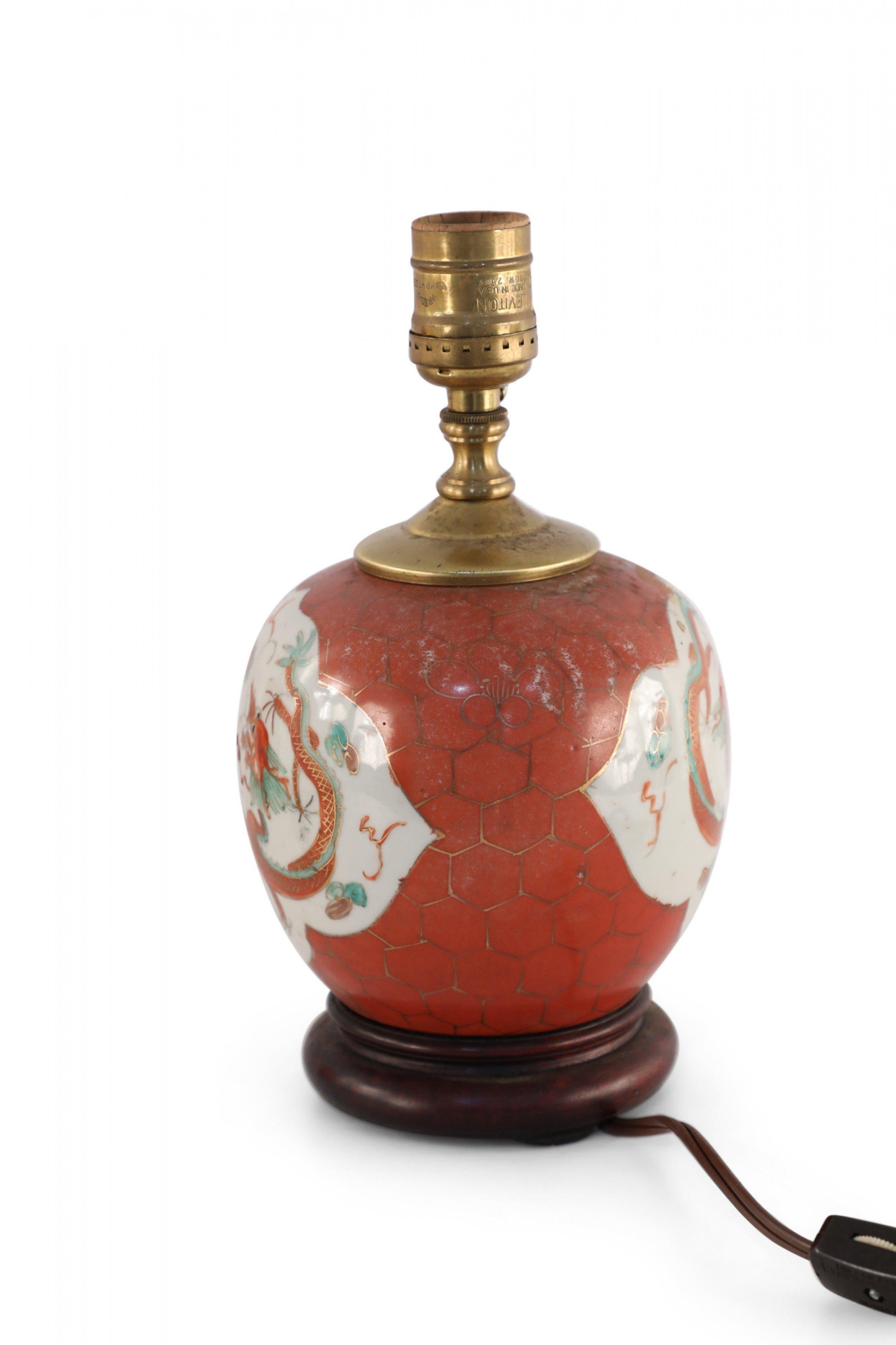 Metal Antique Chinese Orange and White Dragon Motif Porcelain Table Lamp For Sale