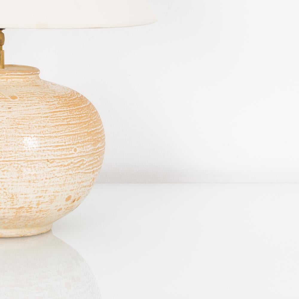 This finely crafted vintage Chinese vase has been fitted with modern brass adjustable fixture and E26 lighting socket. Textured glazes, attractive colors and clean modern forms make this a great fit for neutral contemporary interiors. 23.4