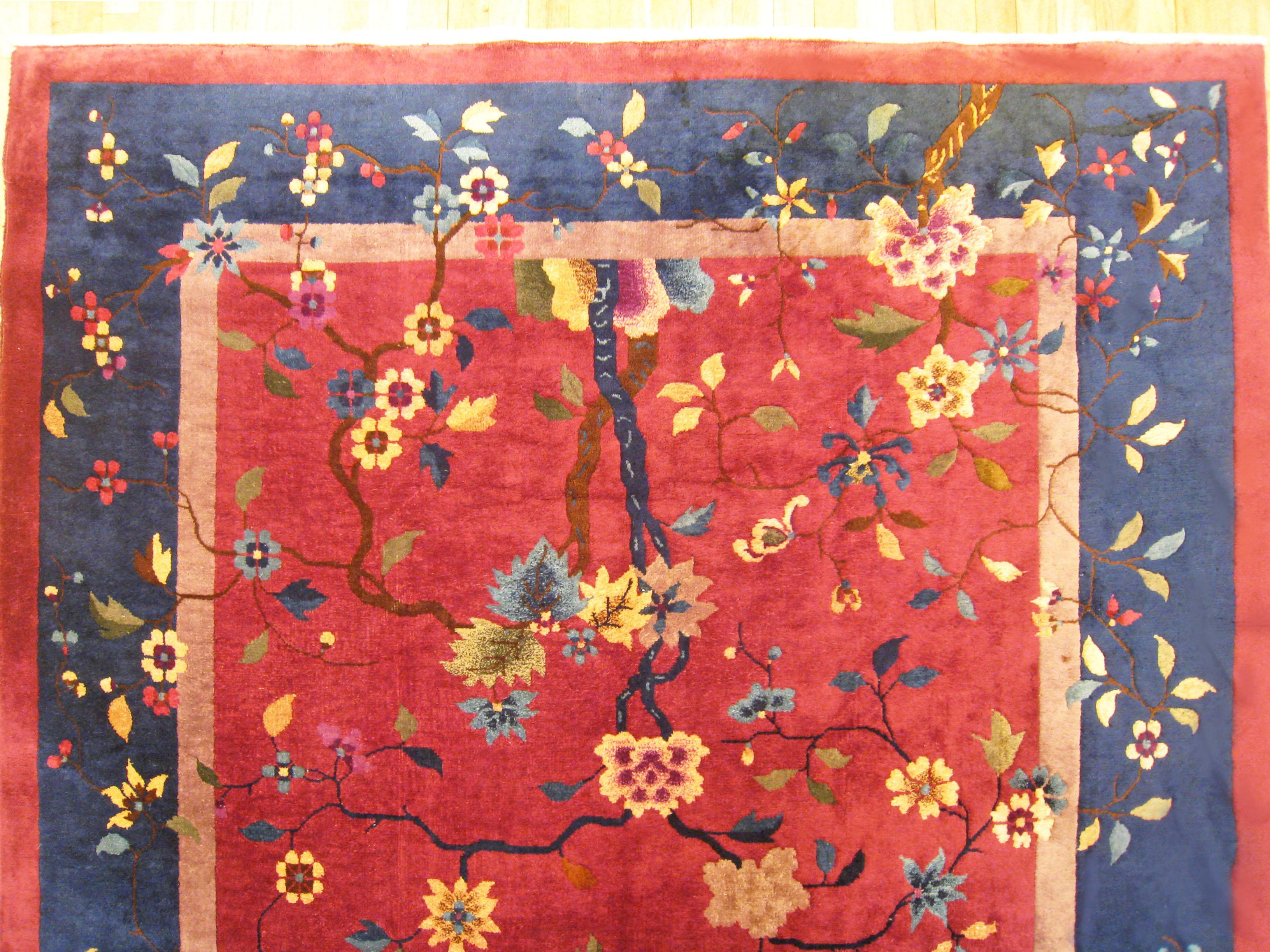 Early 20th Century Antique Chinese Oriental Rug, in Room Size, with Flowers and Red and Blue Tones For Sale