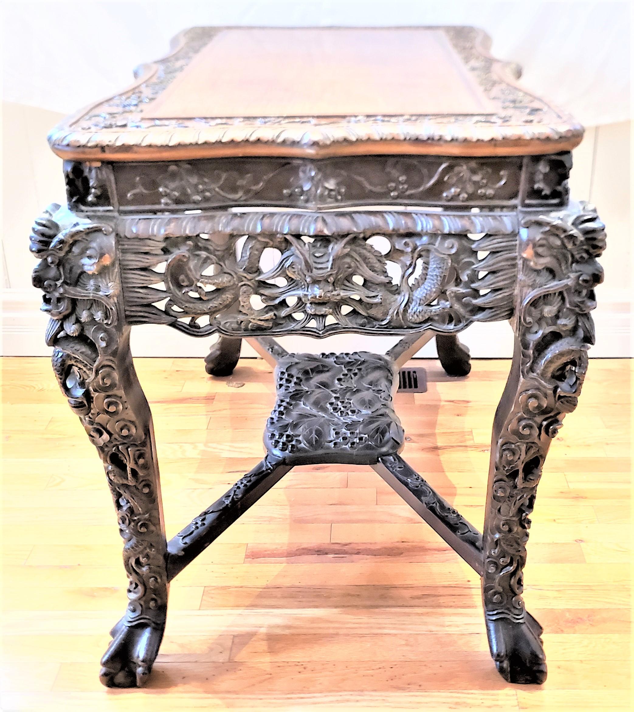 Elm Antique Chinese Ornately Carved Writing or Accent Table with Dragons & Fruits For Sale