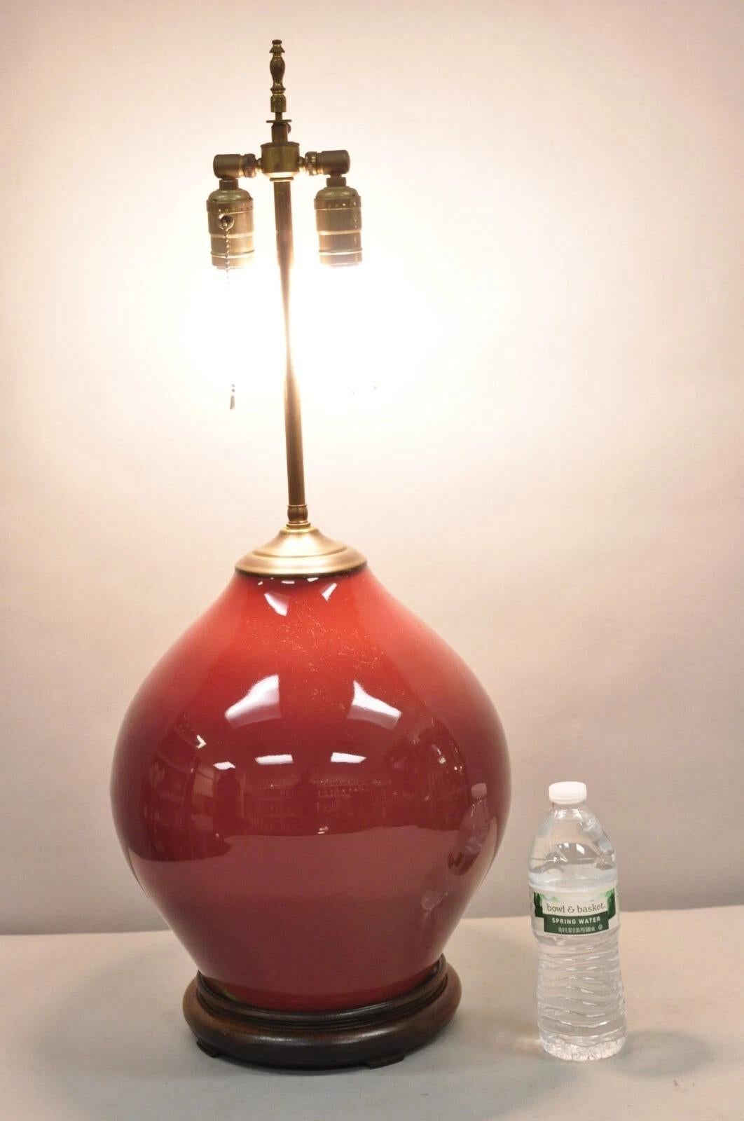 Antique Chinese Oxblood Red Glazed Porcelain Ceramic Bulbous Jardinierie Table Lamp. Circa Early 20th Century. Measurements: 30