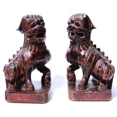 Antique Chinese Pair of Red Lacquered Wooden Fu Dogs, Qing Dynasty