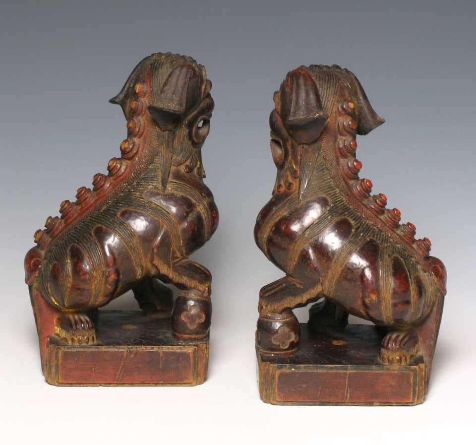 Carved Antique Chinese Pair of Red Lacquered Wooden Fu Dogs, Qing Dynasty For Sale