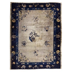 Tapis chinois pékinois bleu ancien, noué à la main 