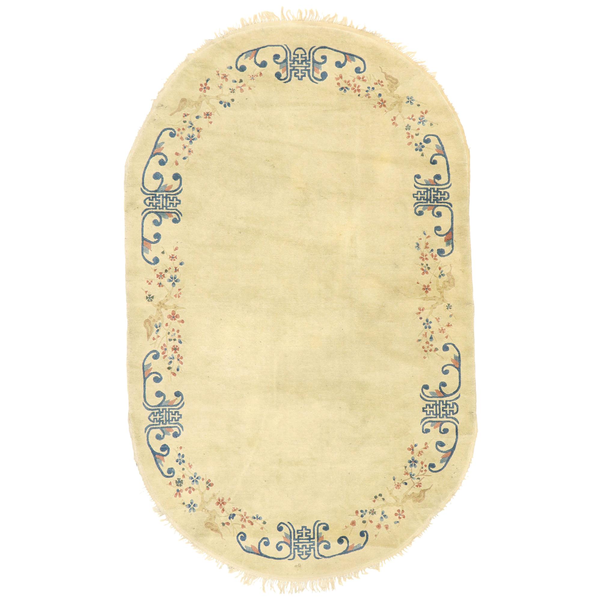 Antique Chinese Peking Oval Rug with Romantic Chinoiserie Style For Sale