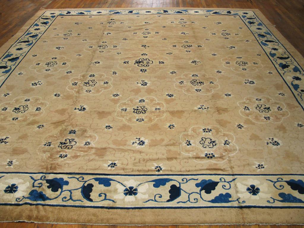 #19307
Beijing Carpet
Northeast China
370 x 417 cm
Circa 1880’s
The field design on this top condition antique Peking (Beijing) carpet is adapted from silk brocade textiles. 
The beige field displays a taupe-rust allover pattern of grape leaves and