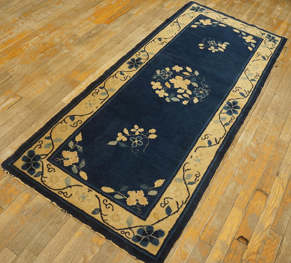 Antique Chinese Peking rug. Measures: 2' 8'' x 6' 0''.