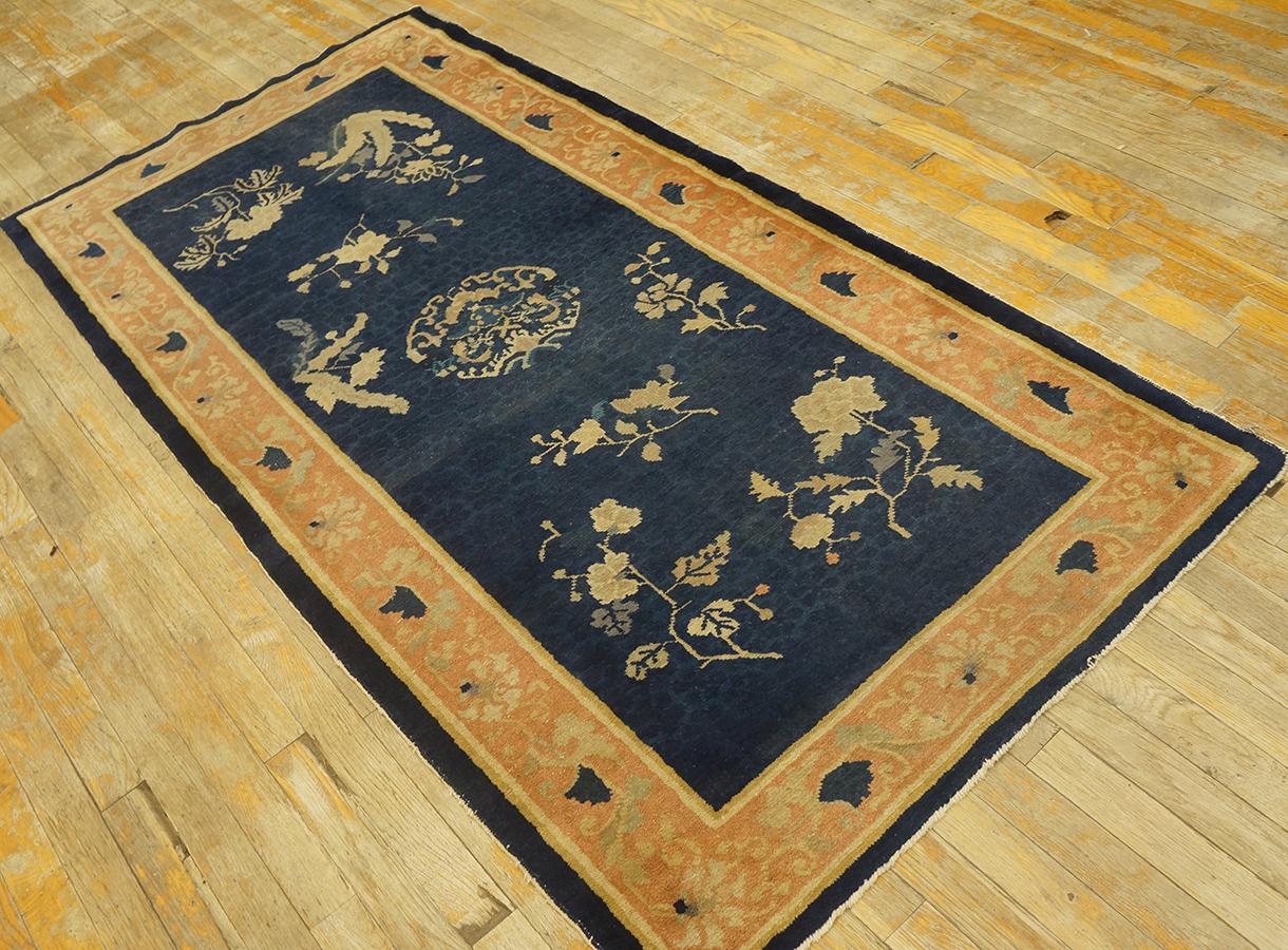 Antique Chinese Peking rug. Measures: 3' 2'' x 6' 2''.