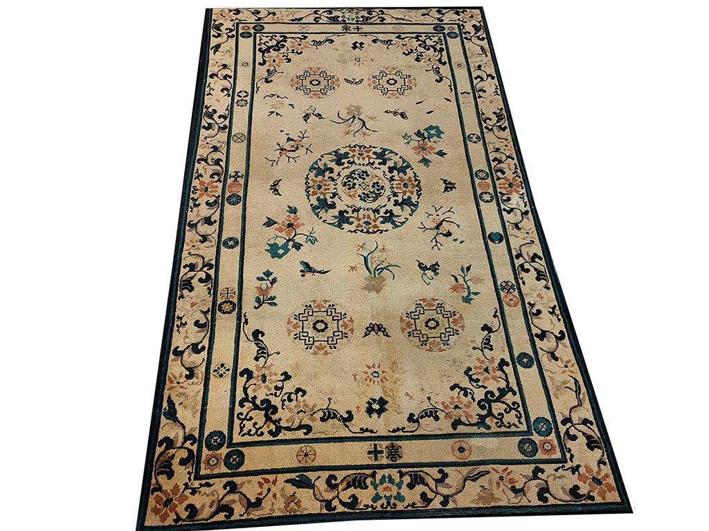 Antique Chinese Peking rug, size: 4' 0'' x 6' 9''.