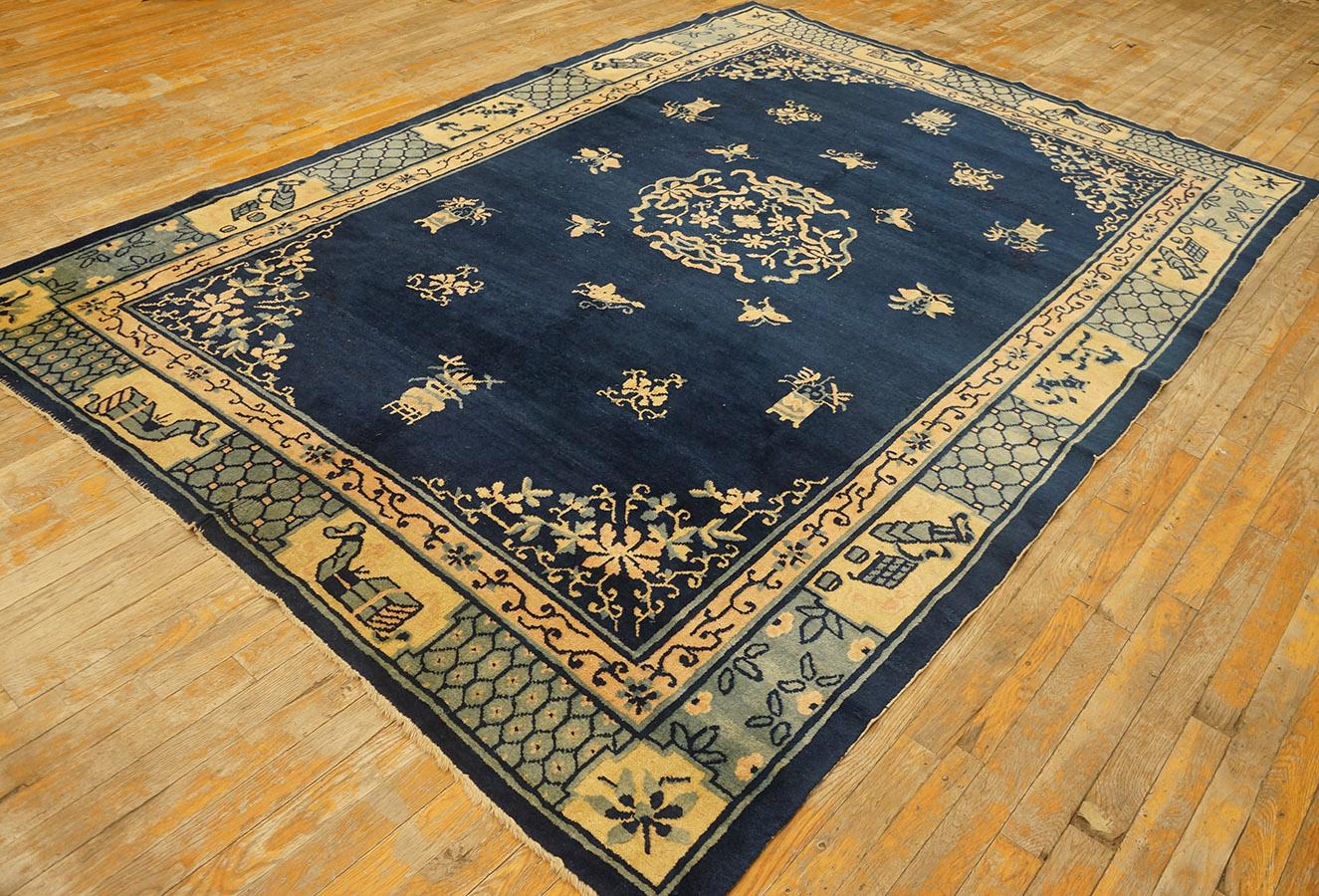 Antique Chinese Peking rug measures: 6' 0'' x 8' 6''.