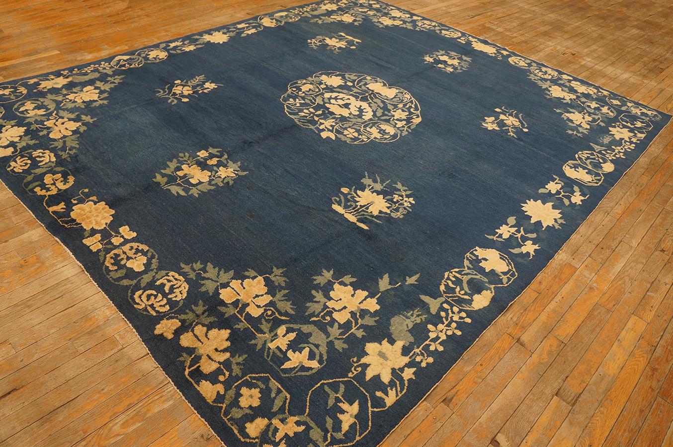 Antique Chinese Peking rug. Measures 8' 0''x 9' 6''.
