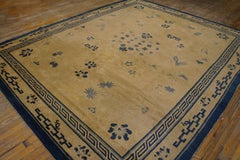 1900s Beige Open Field & Blue Border Foliate Pattern Antique Chinese Peking Rug