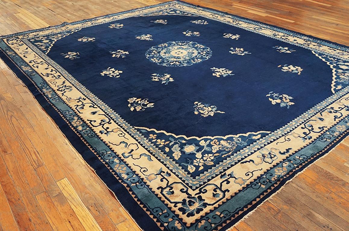 Antique Chinese Peking rug. Measures: 9'2