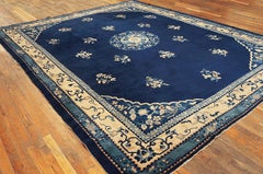Distinctive Floral-Medallion Design on a Blue Field Antique Chinese Peking Rug