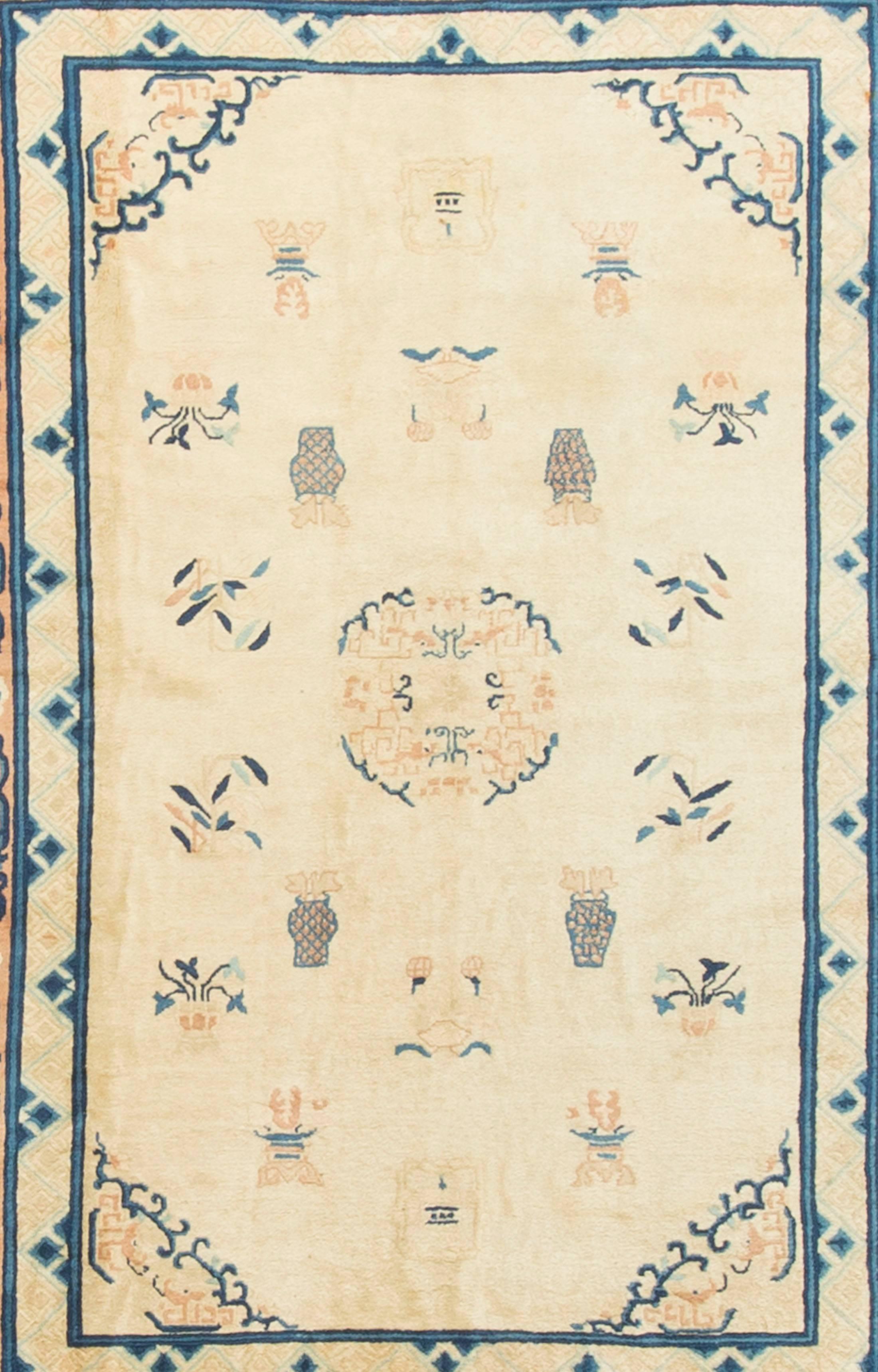 Antique Chinese Peking Rug Carpet Circa 1900. Weaving in Peking began circa 1900 during the revival of Chinese carpet manufacturing when the other weaving areas such as Ningxia moved to the capital. Peking rugs are normally Minimalist with a narrow