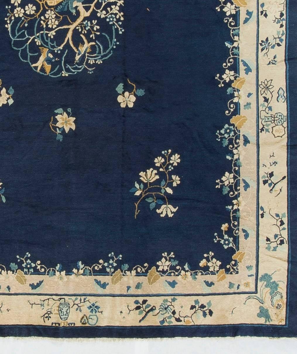 Weaving in Peking began circa 1900 during the revival of Chinese carpet manufacturing when the other weaving areas such as Ningxia moved to the capital. Peking rugs are normally minimalist with a narrow color palette and designs motivated by symbols