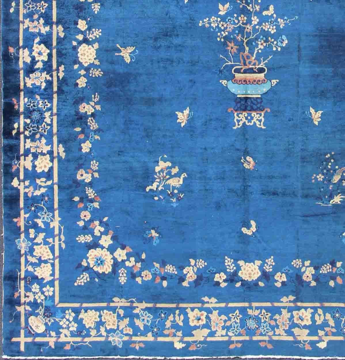 Antique Chinese Peking Rug in Navy Blue with Medallion Flower Vases and Vines. Antique Chinese rug. Chinese Peking rug.  Keivan Woven Arts / rug 19-0802, country of origin / type: China / Peking , circa 1890.
Measures: 12'4 x 14'6.
 Alive with color