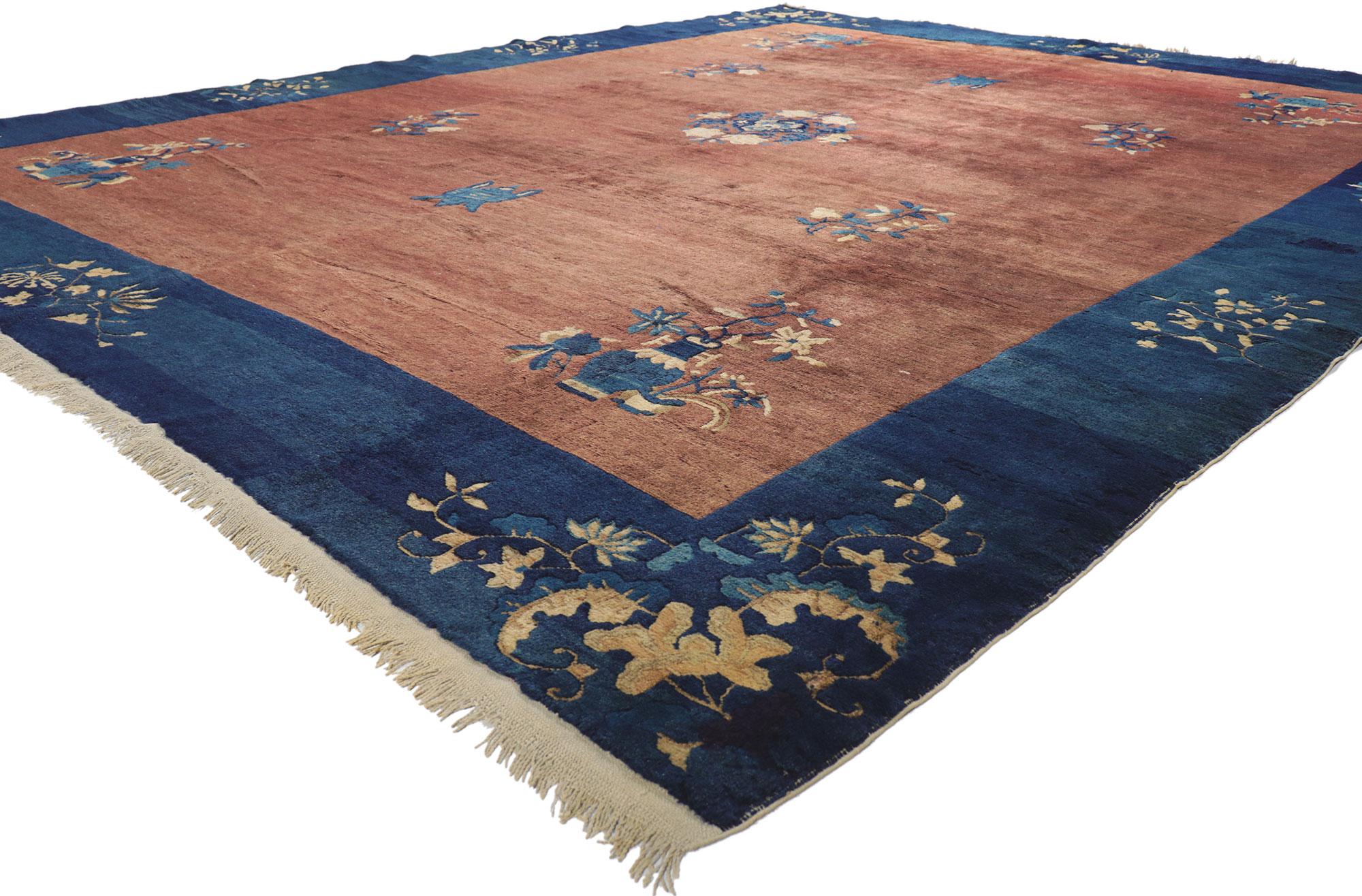 78422 Antique Chinese Peking Rug, 09'00 x 11'02. 
Chinoiserie chic meets earth-tone elegance in this hand knotted wool antique Chinese Peking rug. The decorative floral vase design and earthy hues woven into this piece work together creating a