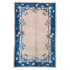 Vintage Chinese Peking Rug with a Sand Field and Blue Border