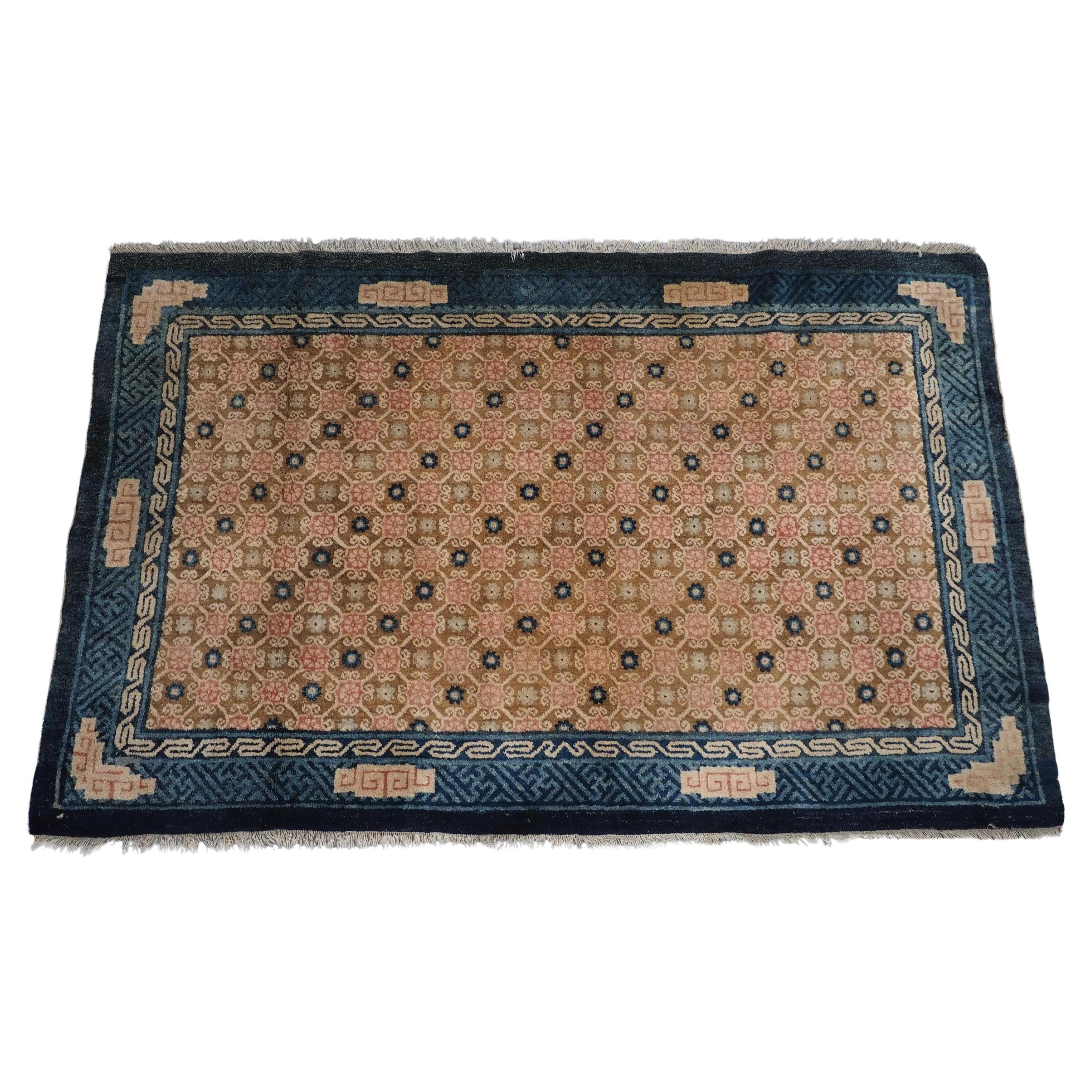 Antique Chinese Peking rug with lattice design.  Circa 1900.
