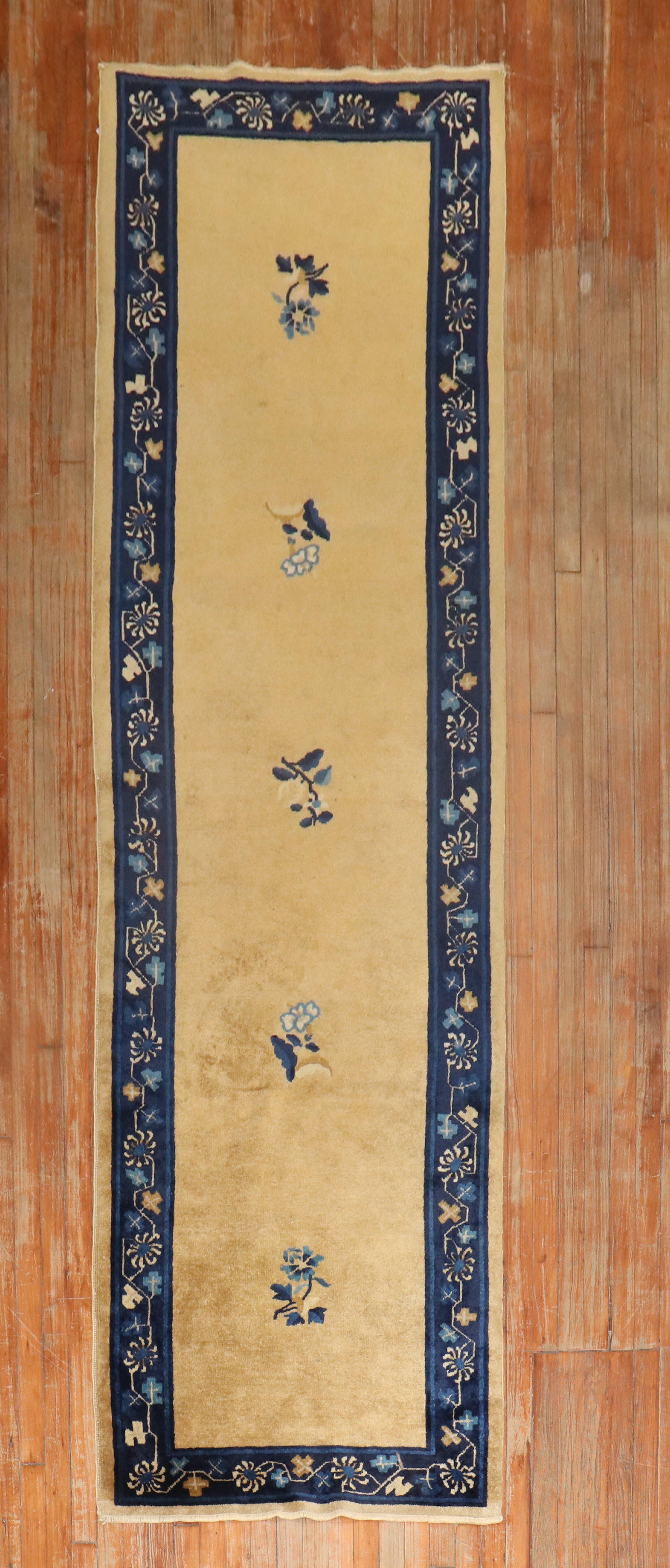 Beautiful Chinese Art Deco floral full pile condition runner in mustard and navy

Measures: 3' x 10'7